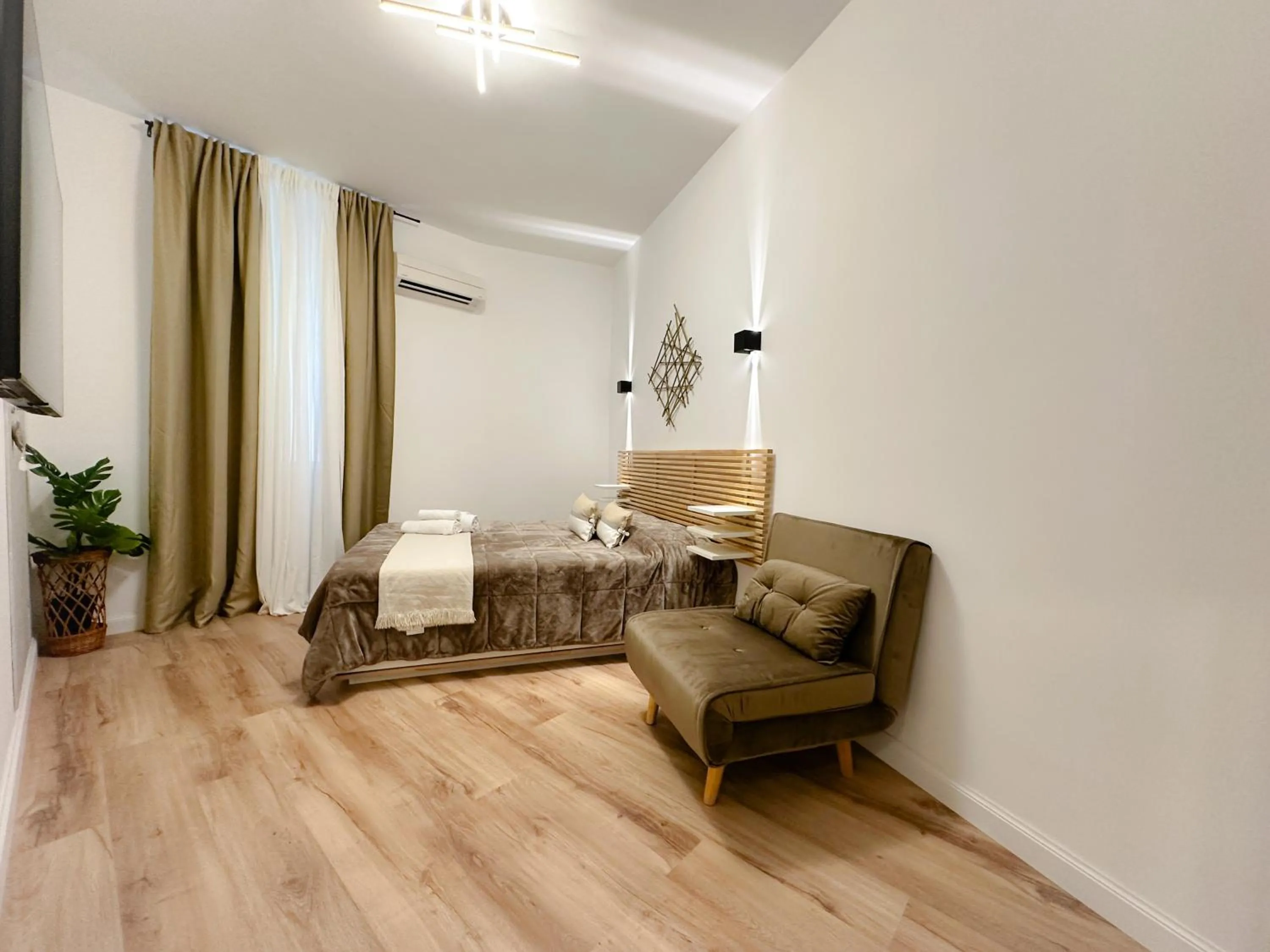 Bed in Colosseum Luxury Guest House