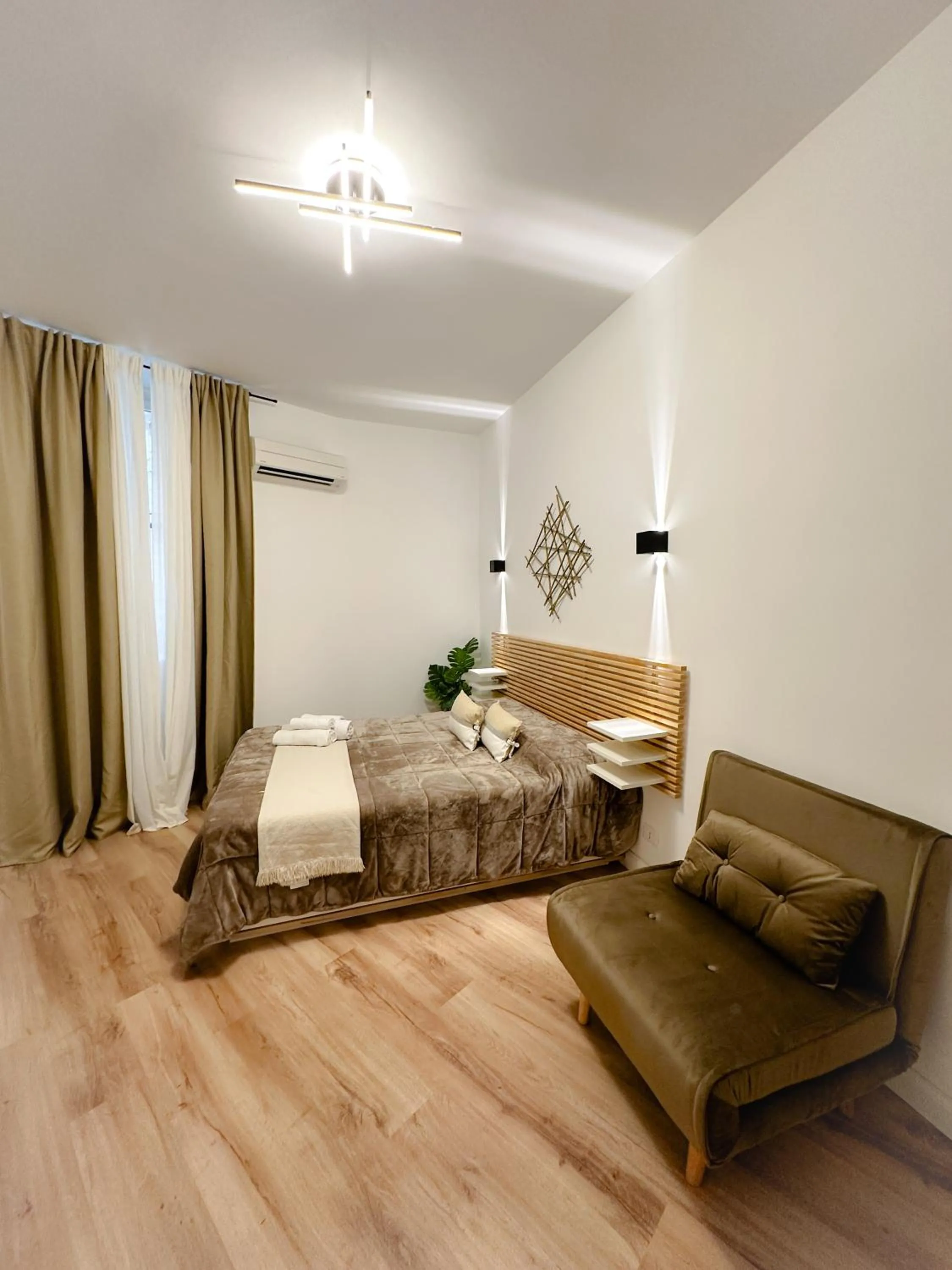 Bed in Colosseum Luxury Guest House