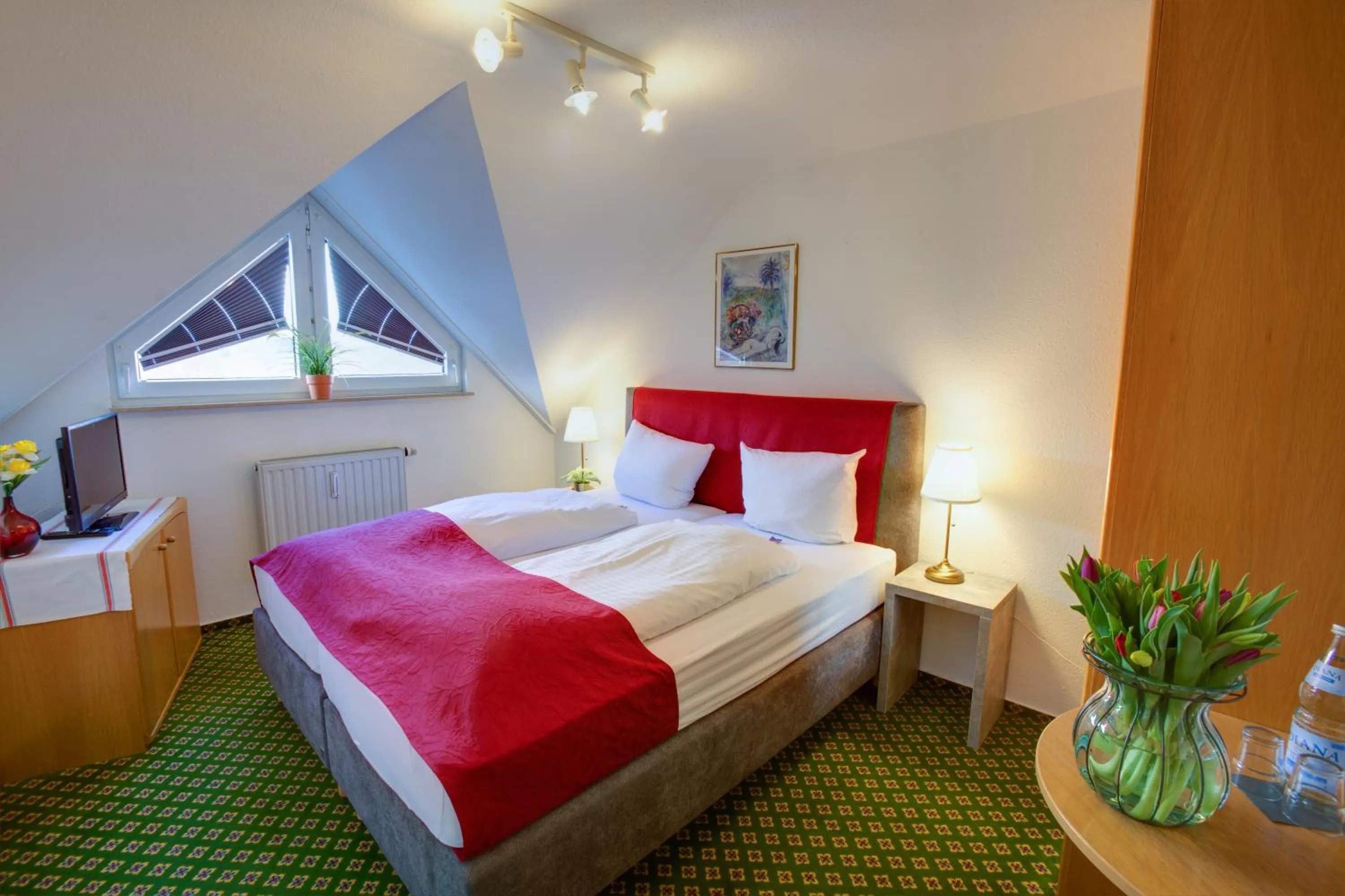 Bed in Hotel Leo Mühlhausen