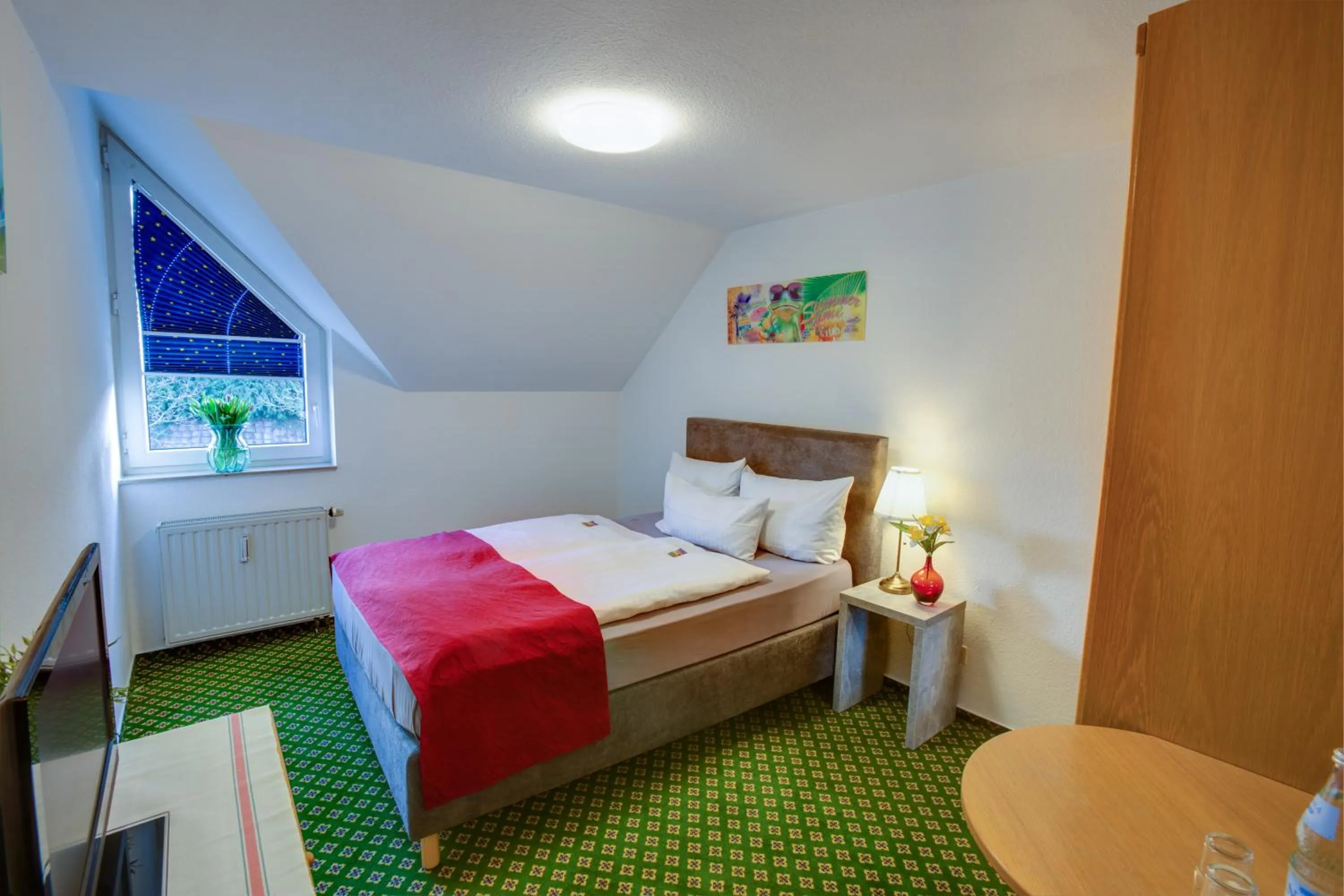 Bed in Hotel Leo Mühlhausen