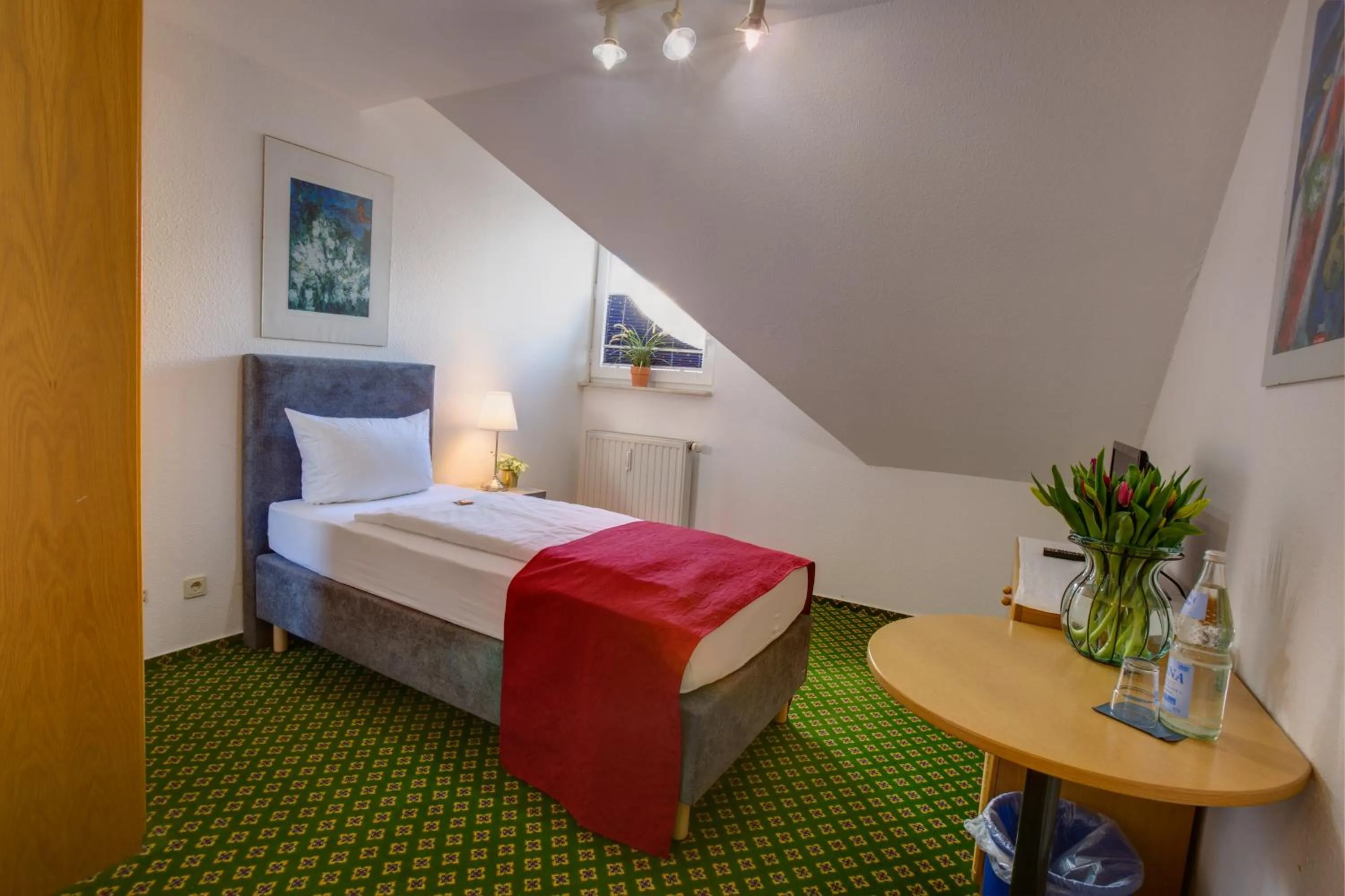 Bed in Hotel Leo Mühlhausen