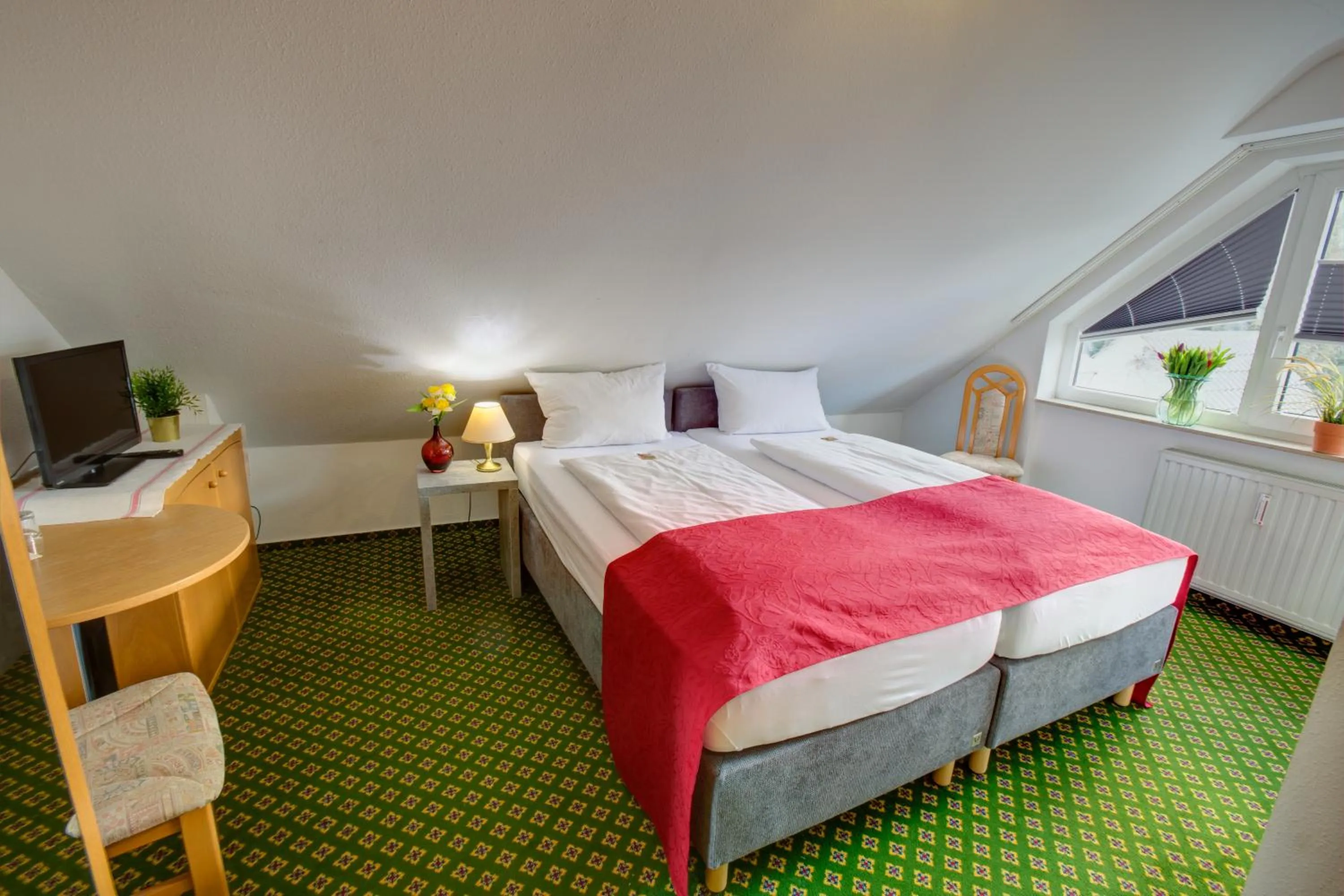 Bed in Hotel Leo Mühlhausen