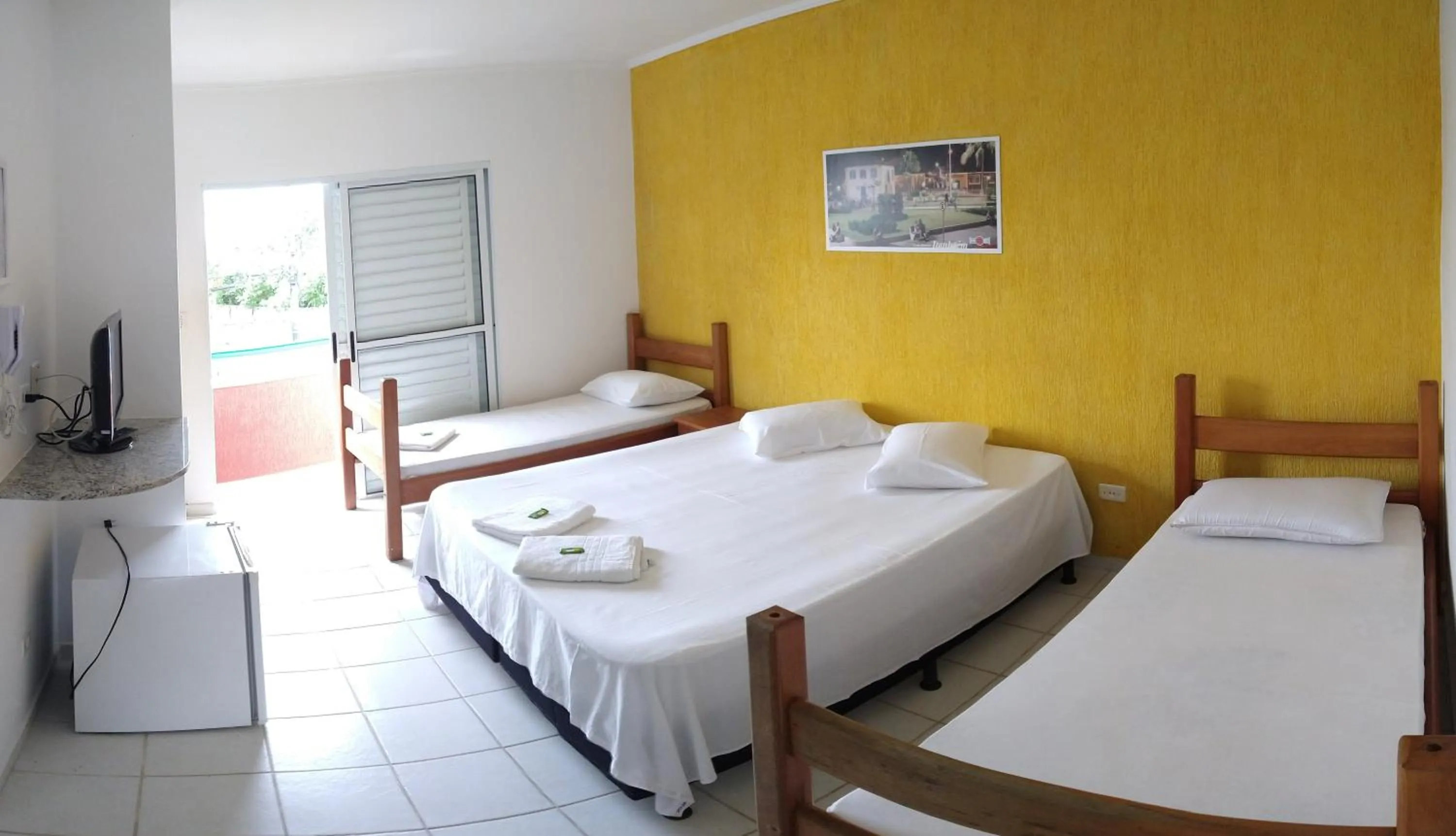 Photo of the whole room, Bed in HOTEL CLUBE AZUL DO MAR