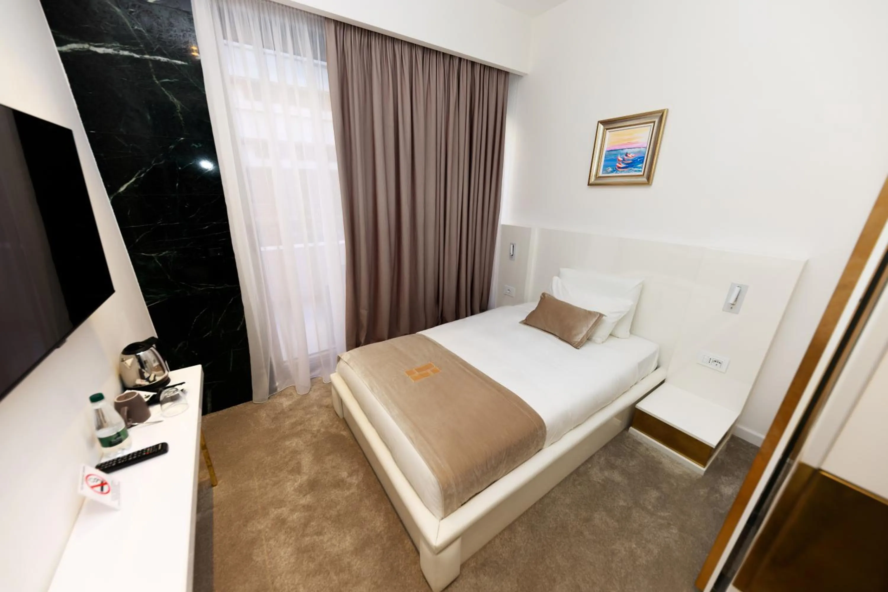 Bed in Habitat Hotel Tirana