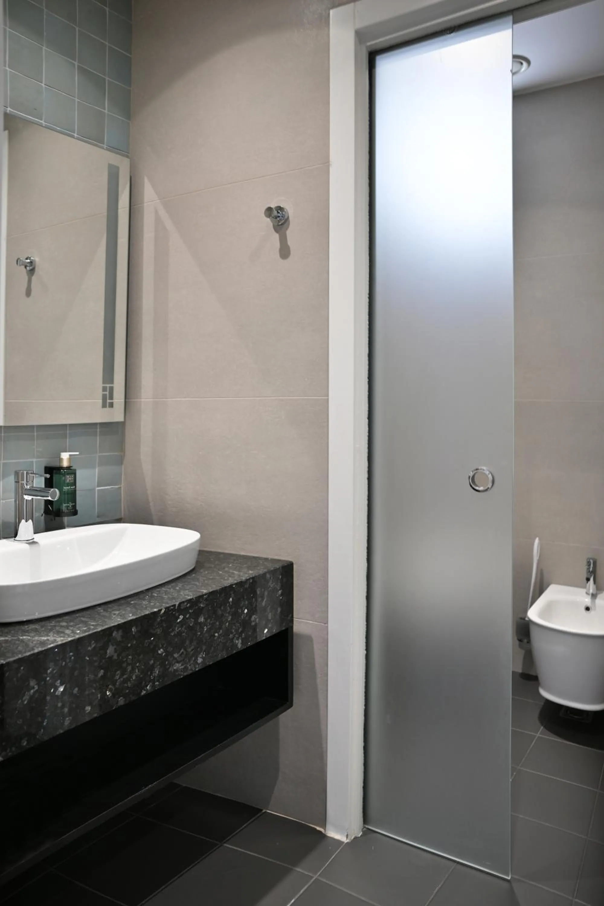 Toilet in Habitat Hotel Tirana