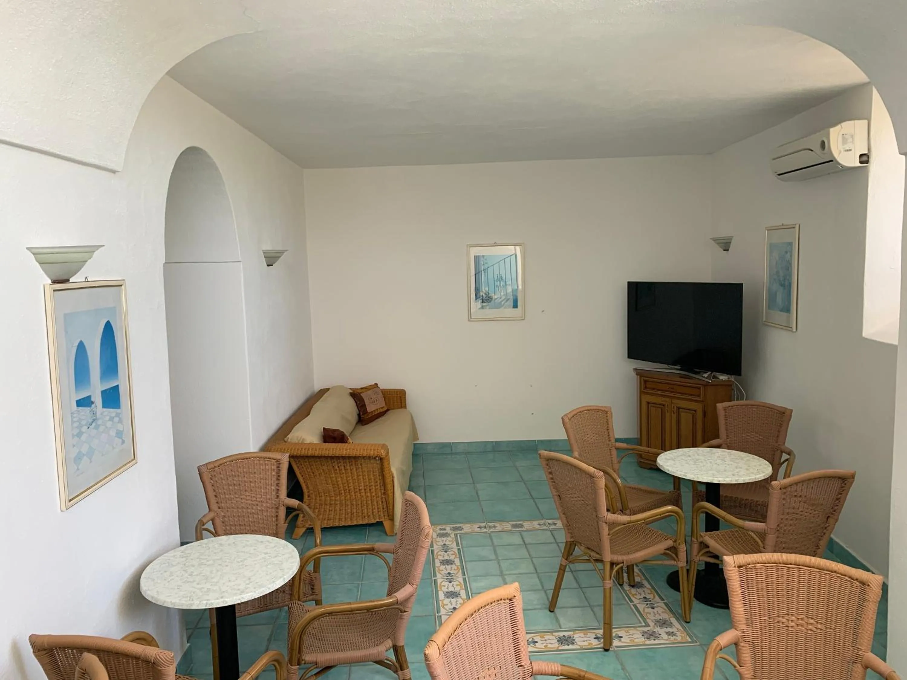 Communal lounge/ TV room in Pensione Casa Verde