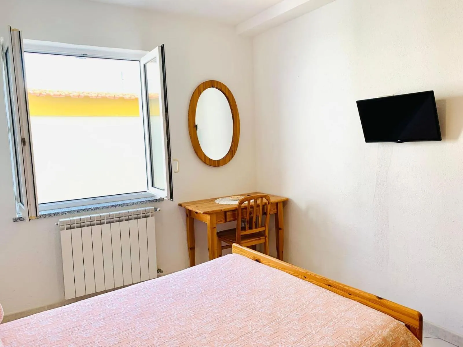 Bed in Pensione Casa Verde