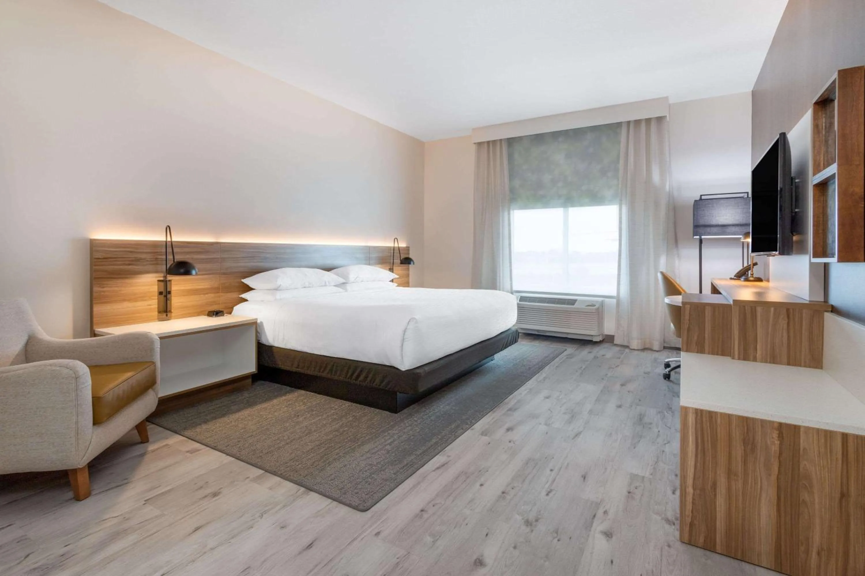 Photo of the whole room, Bed in Wyndham Garden Orlando Airport - Free Airport Shuttle