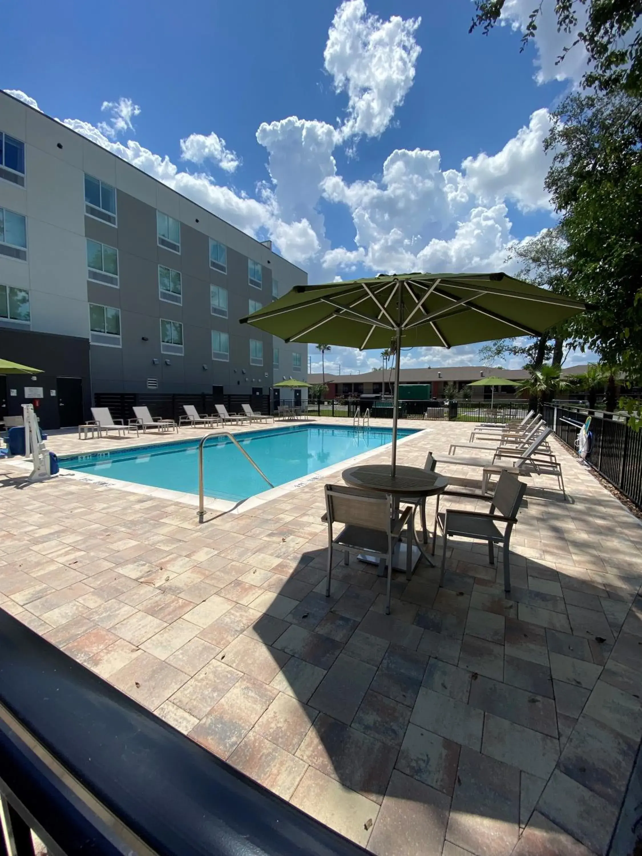 Swimming pool in Wyndham Garden Orlando Airport - Free Airport Shuttle Swimming pool in Wyndham Garden Orlando Airport - Free Airport Shuttle