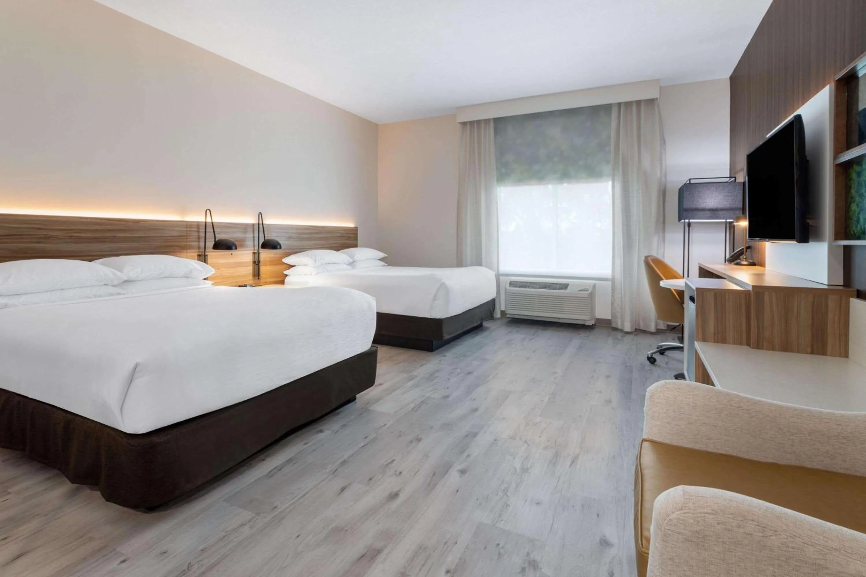 Photo of the whole room, Bed in Wyndham Garden Orlando Airport - Free Airport Shuttle