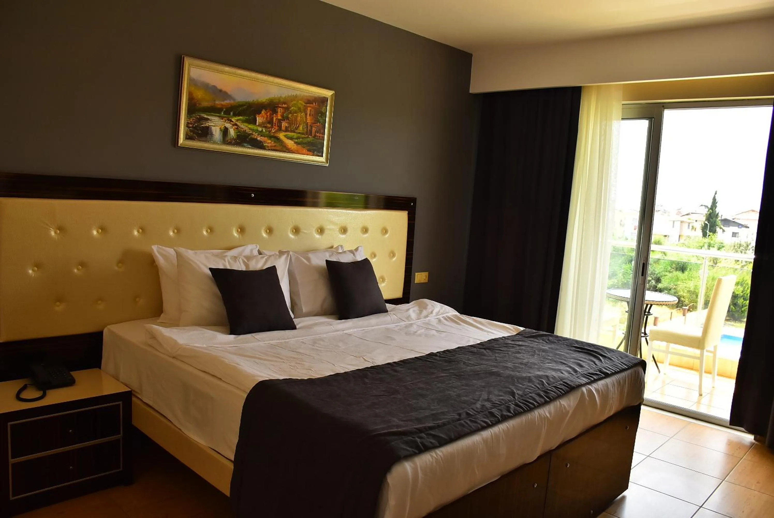 Bed in Nora Suit Hotel