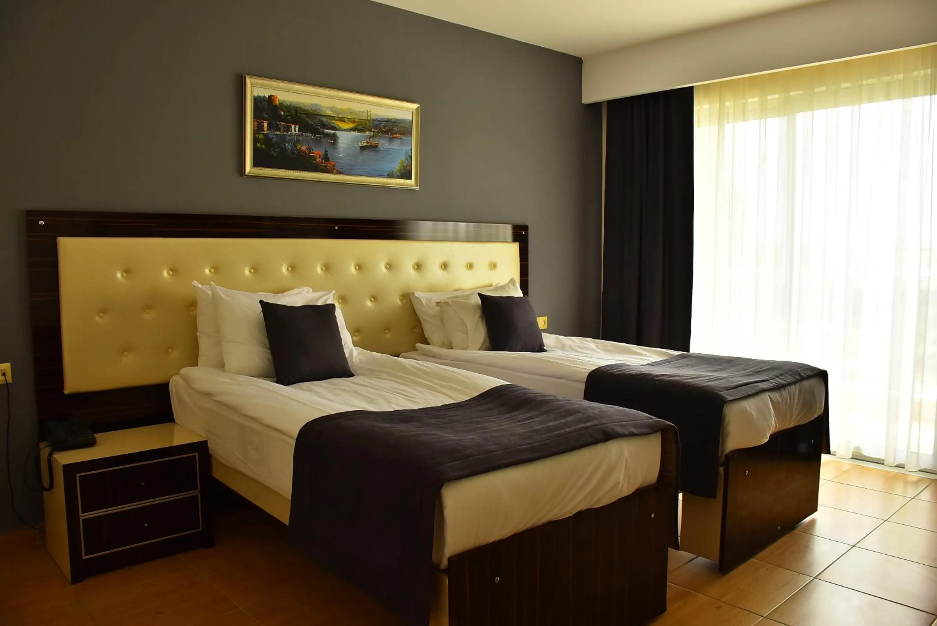 Bed in Nora Suit Hotel