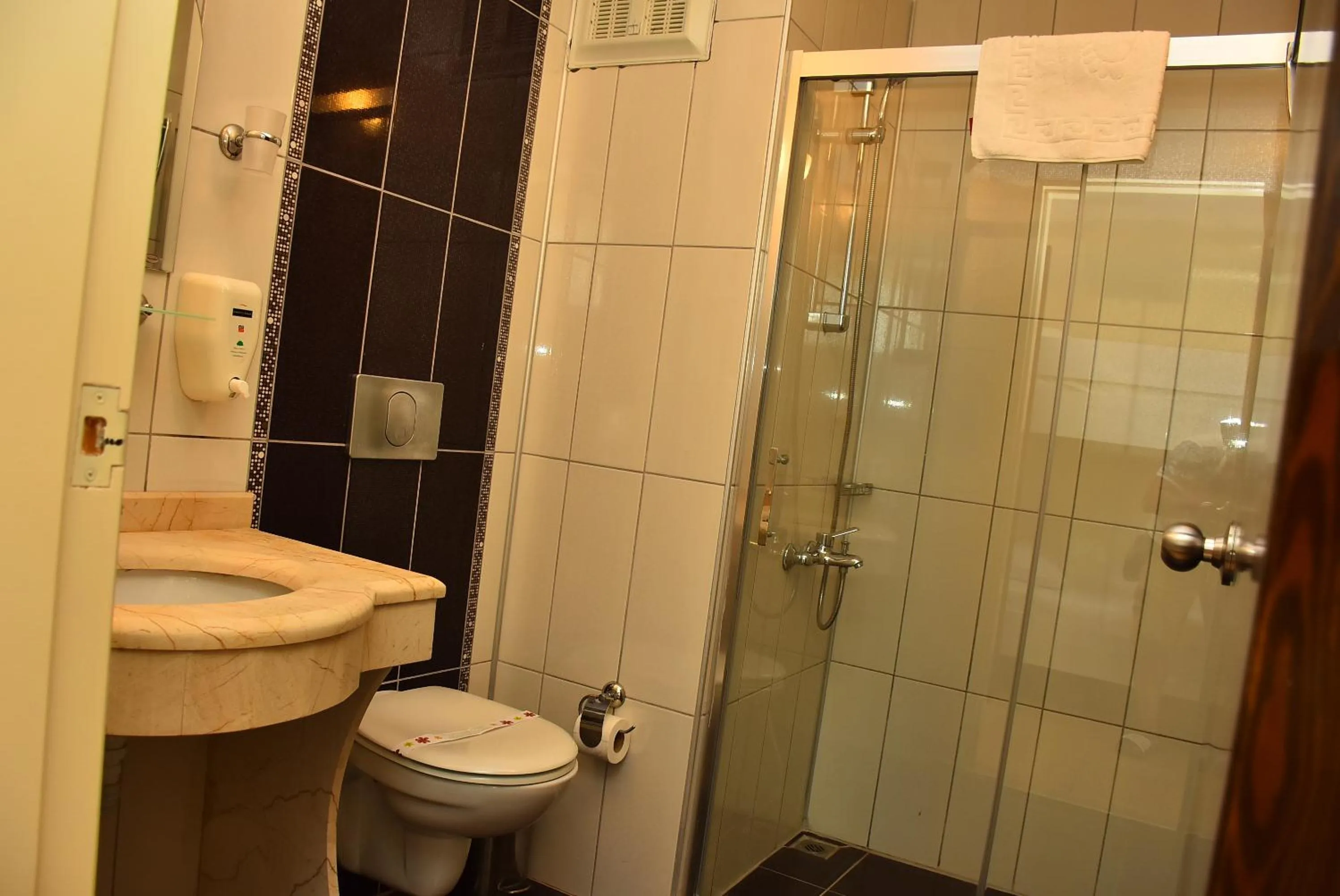 Bathroom in Nora Suit Hotel