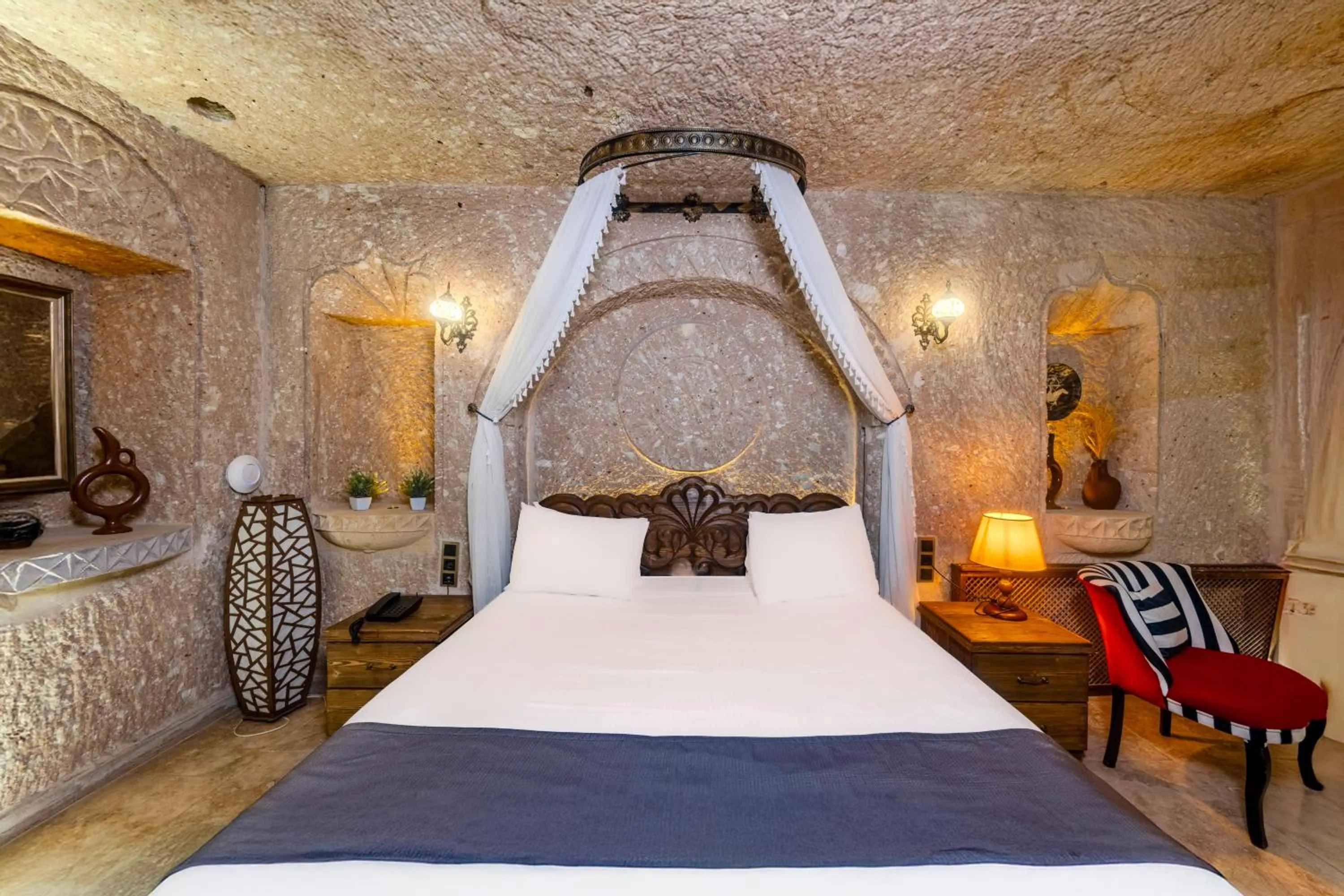 Bed in Pegas Cave Suites