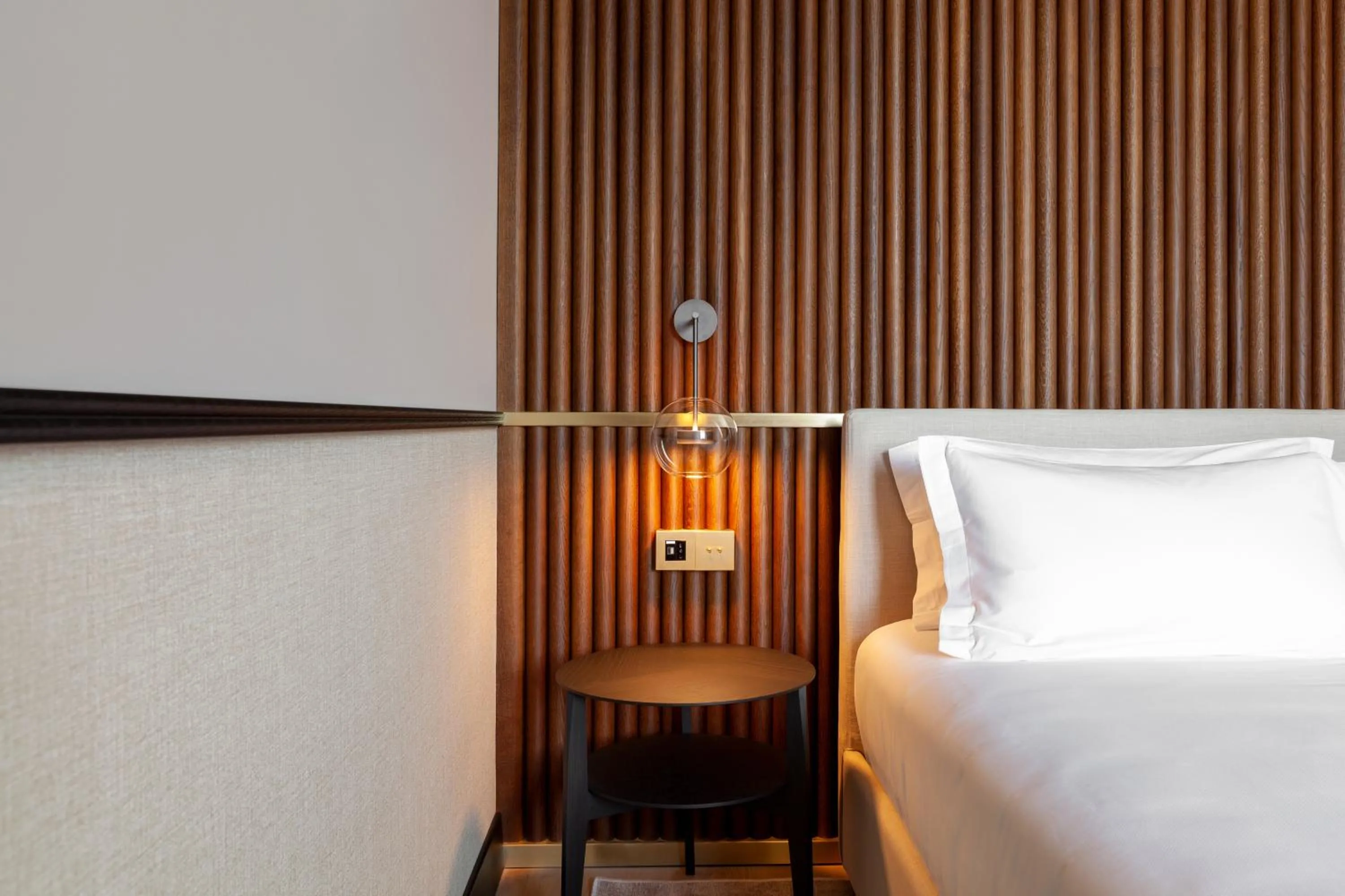 Bed in Amabilia Suites