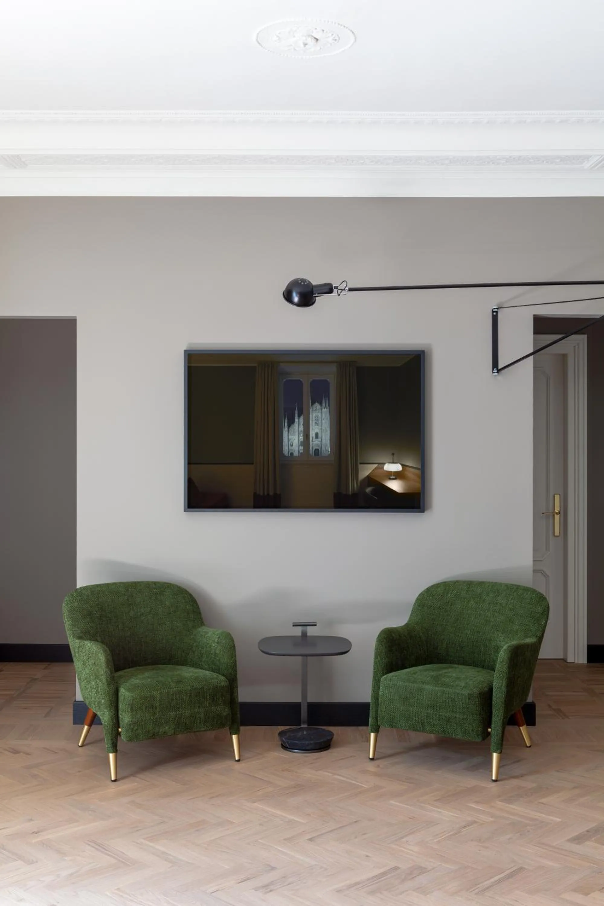 Communal lounge/ TV room in Amabilia Suites