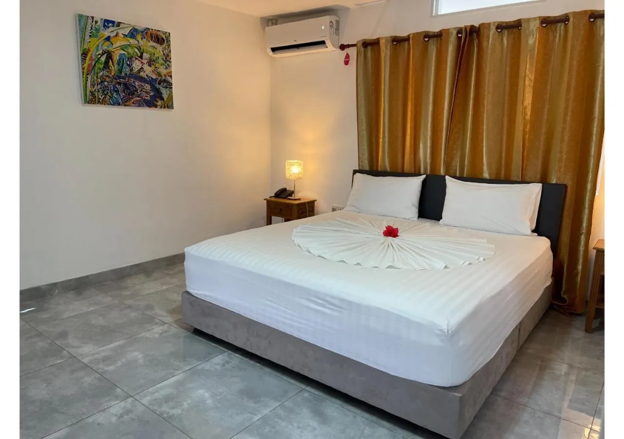 Bedroom, Bed in Anse Soleil Resort