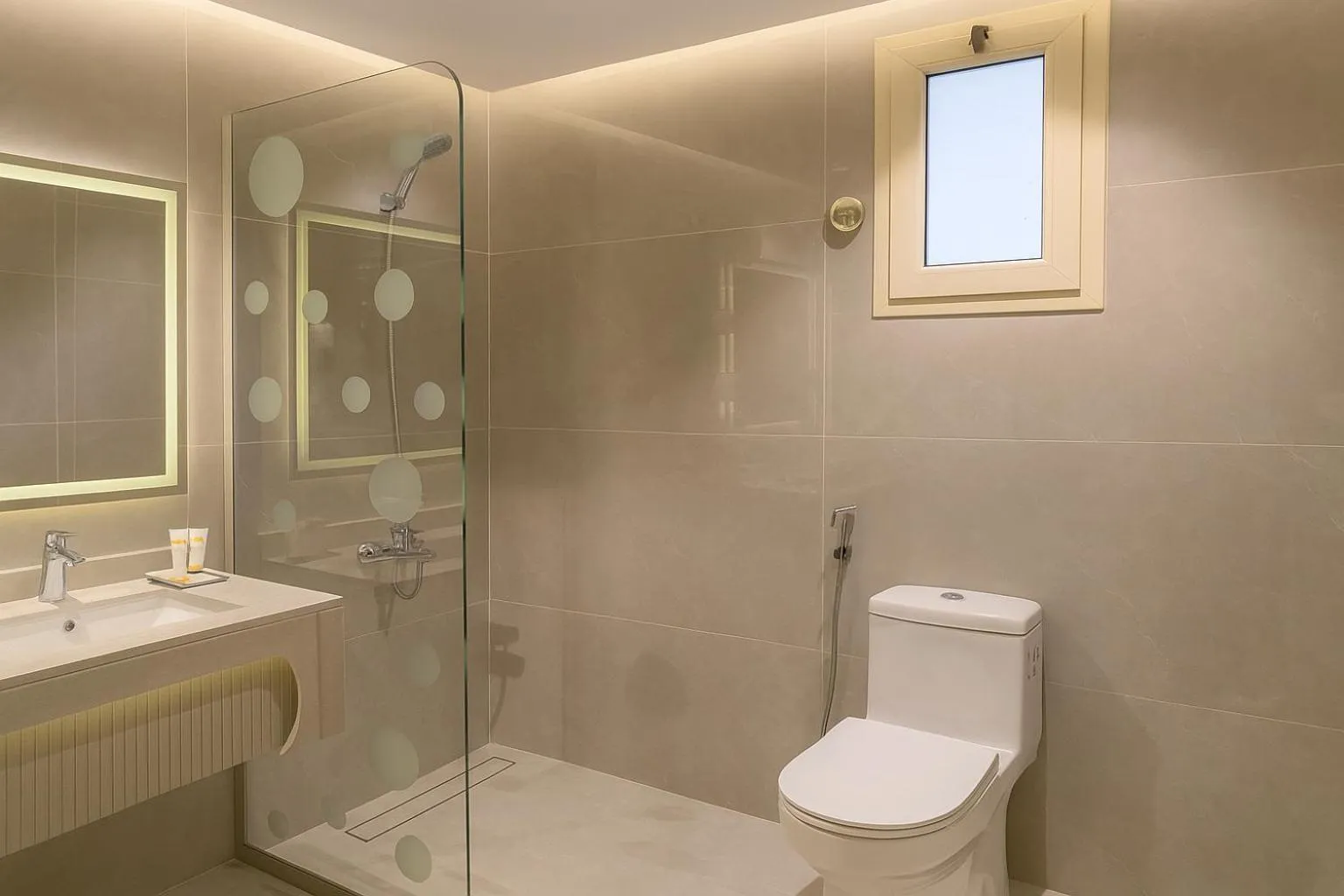 Bathroom in Elite Served Apartments Al Cornich