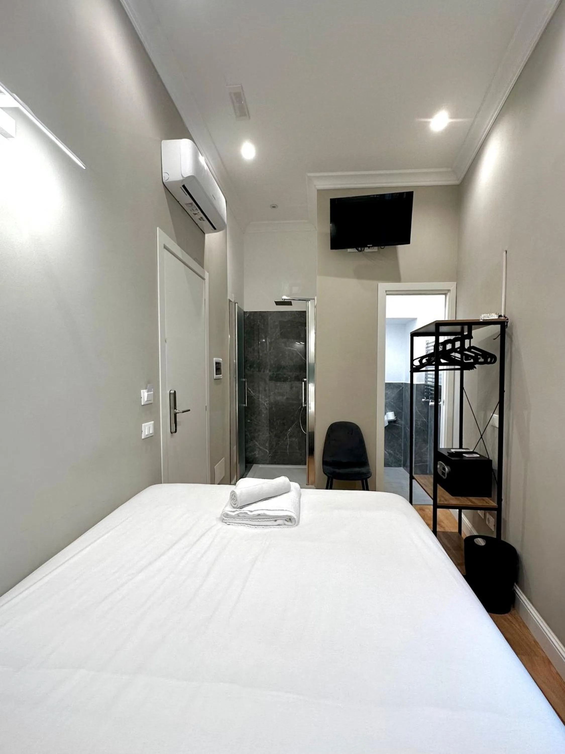 Bed in AD Suites Tritone