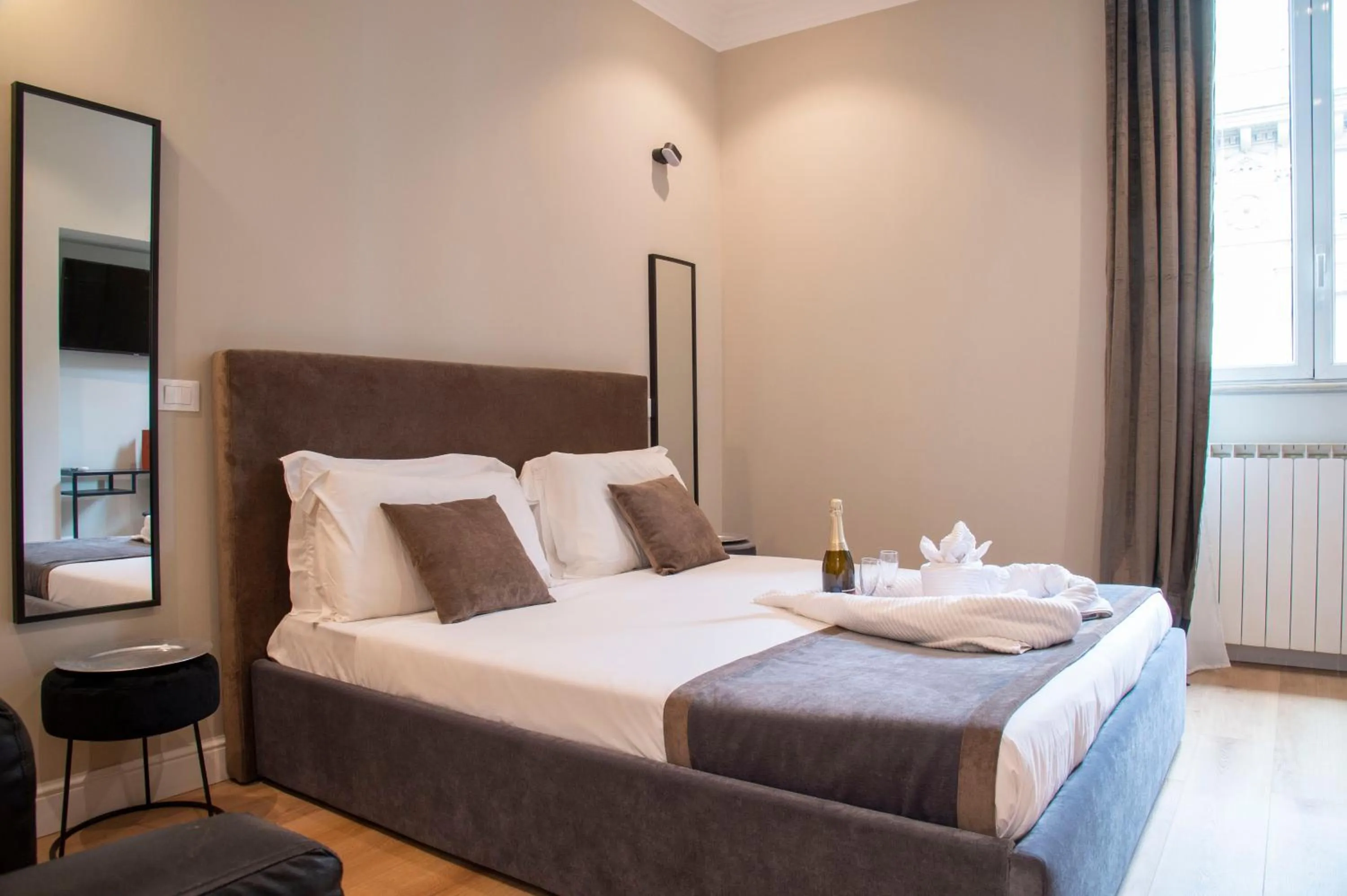 Bed in AD Suites Tritone