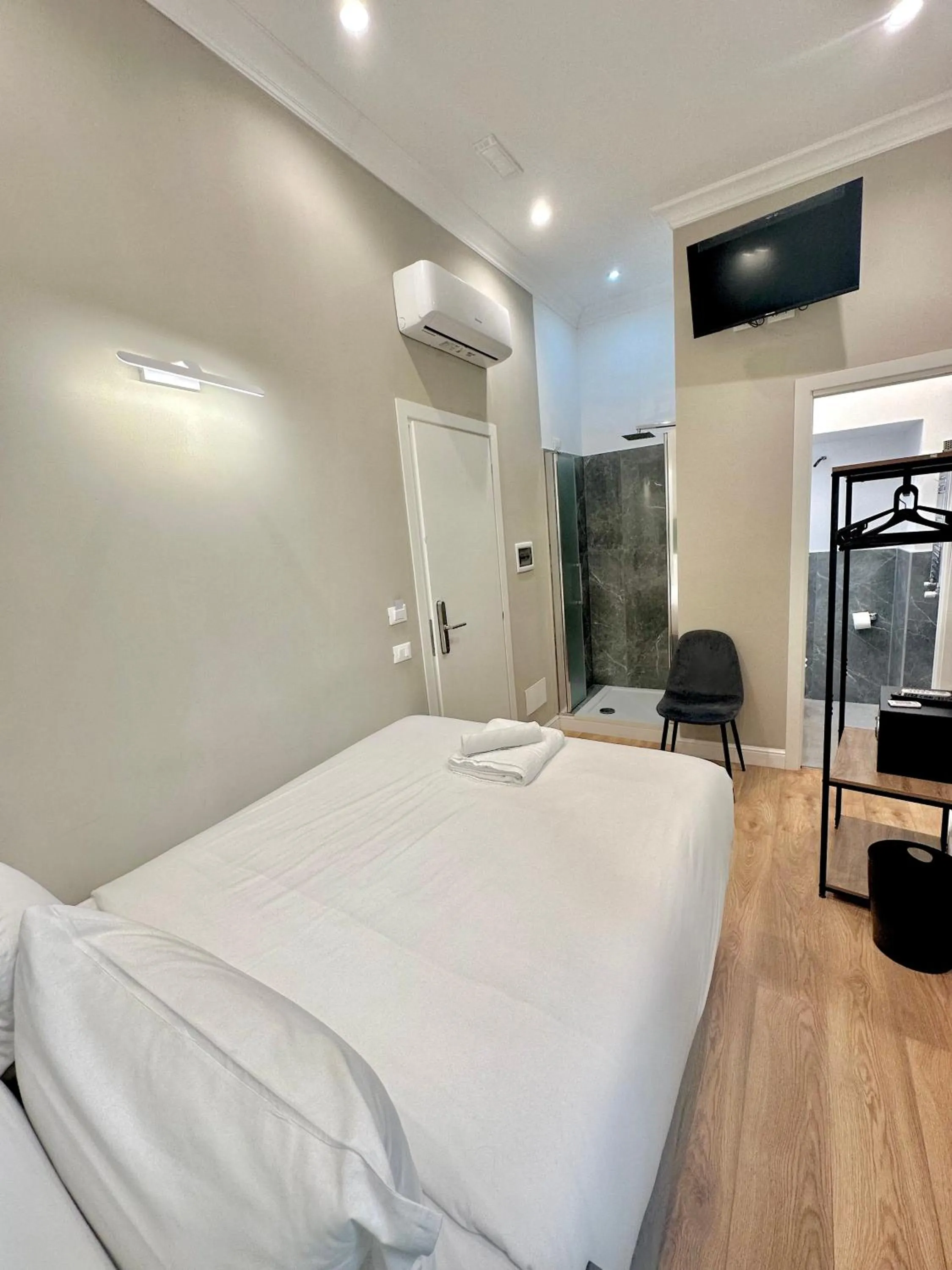 Bed in AD Suites Tritone