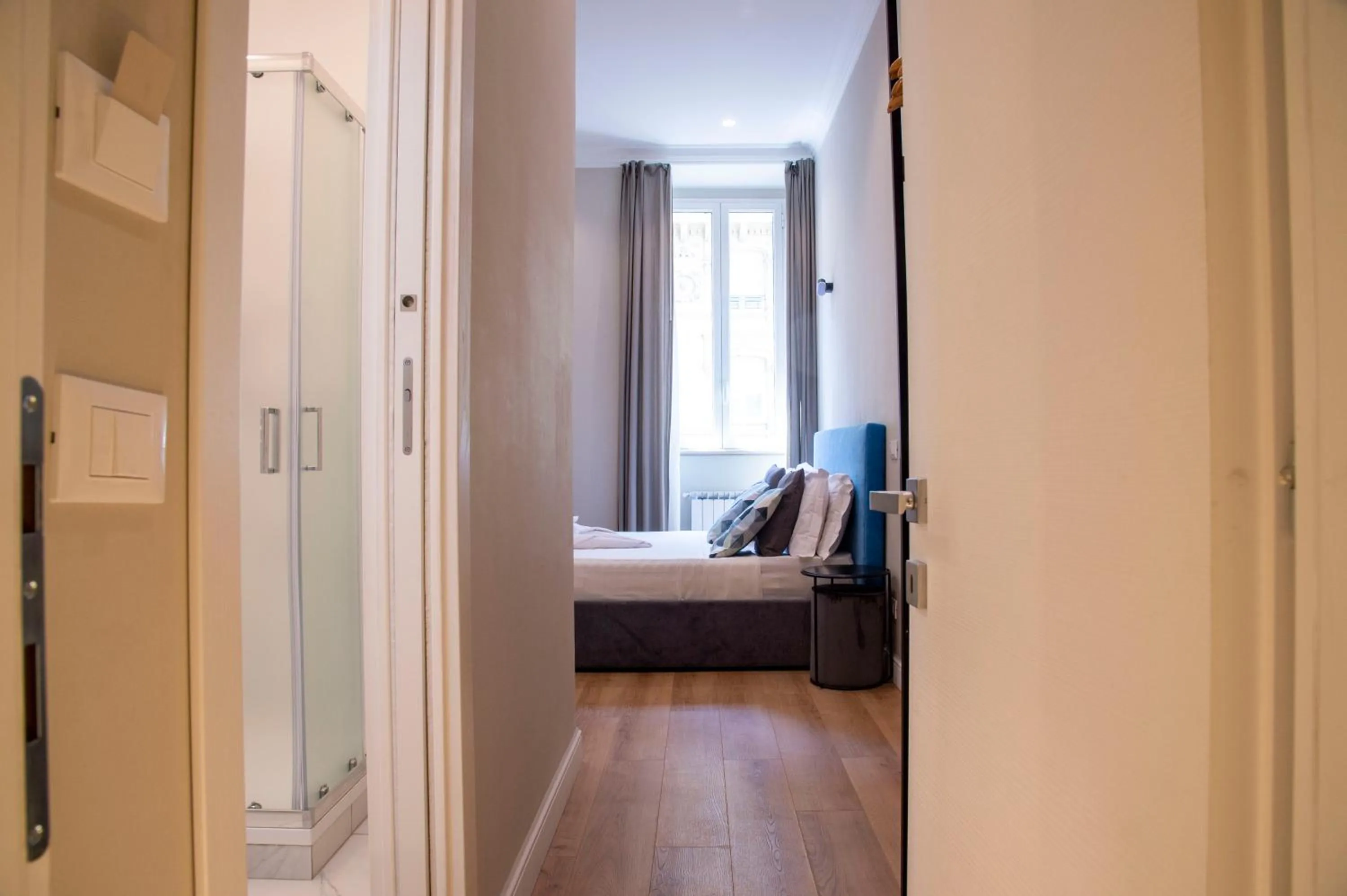 Bed in AD Suites Tritone