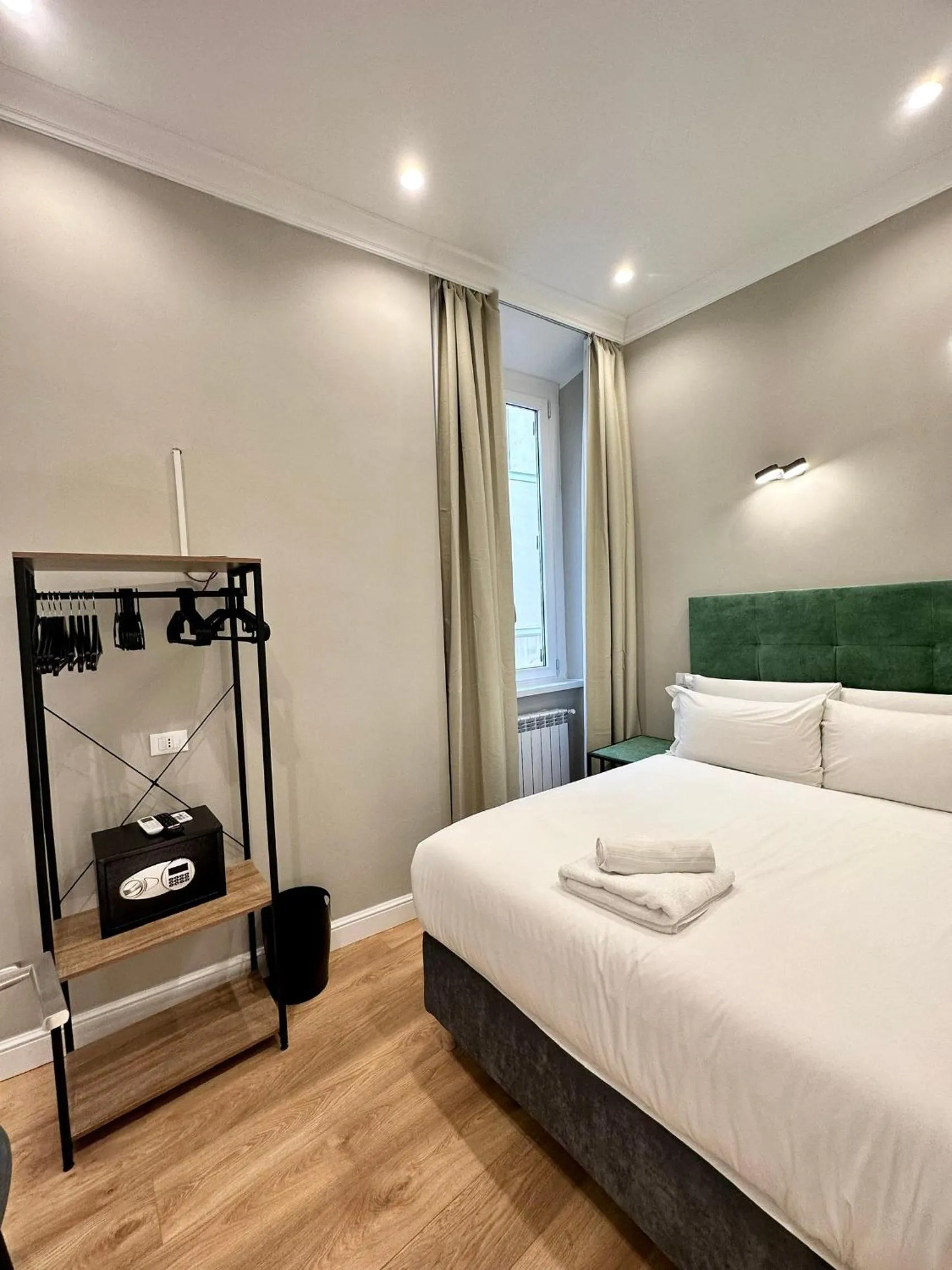 Bed in AD Suites Tritone