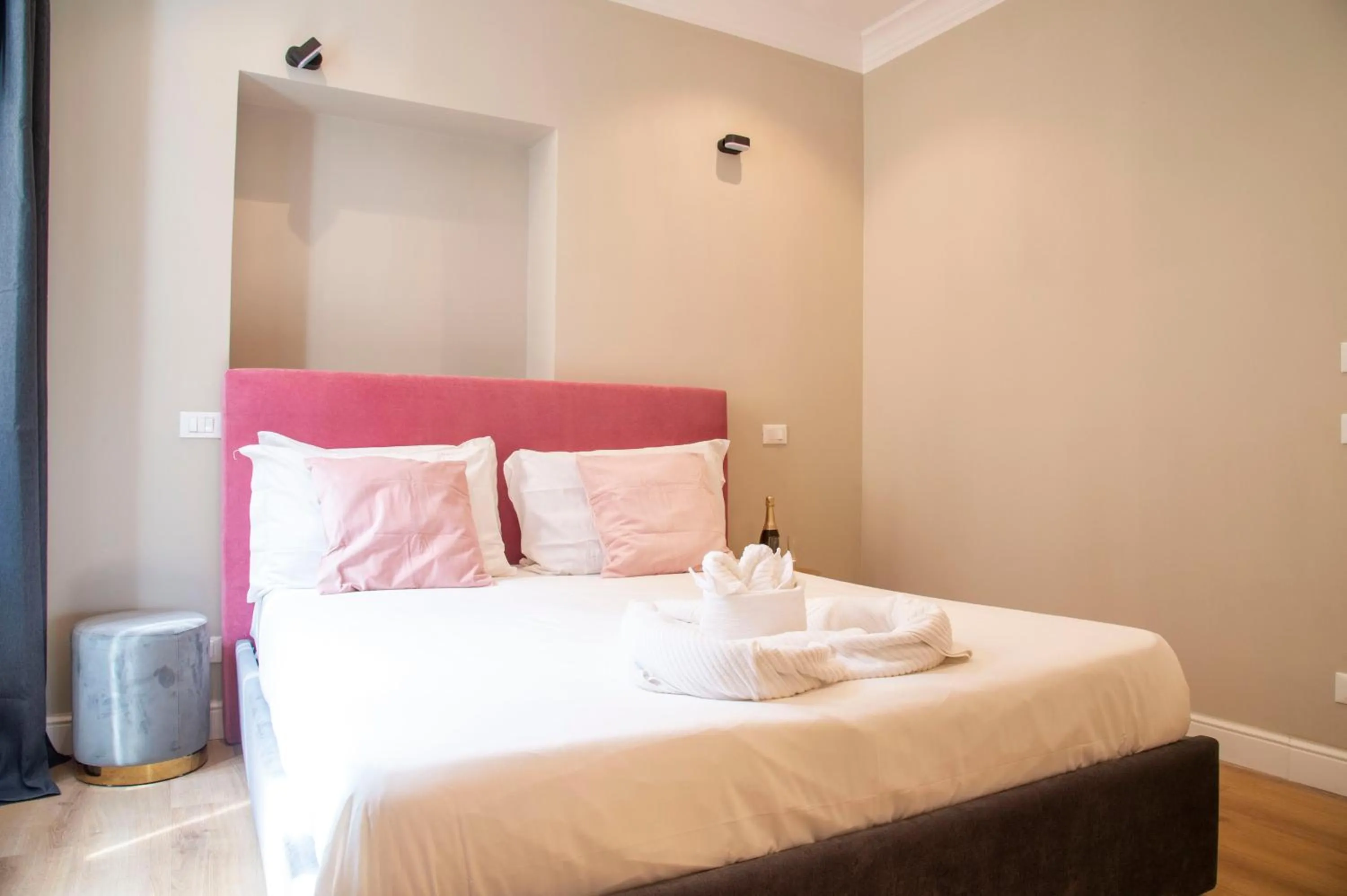 Bed in AD Suites Tritone