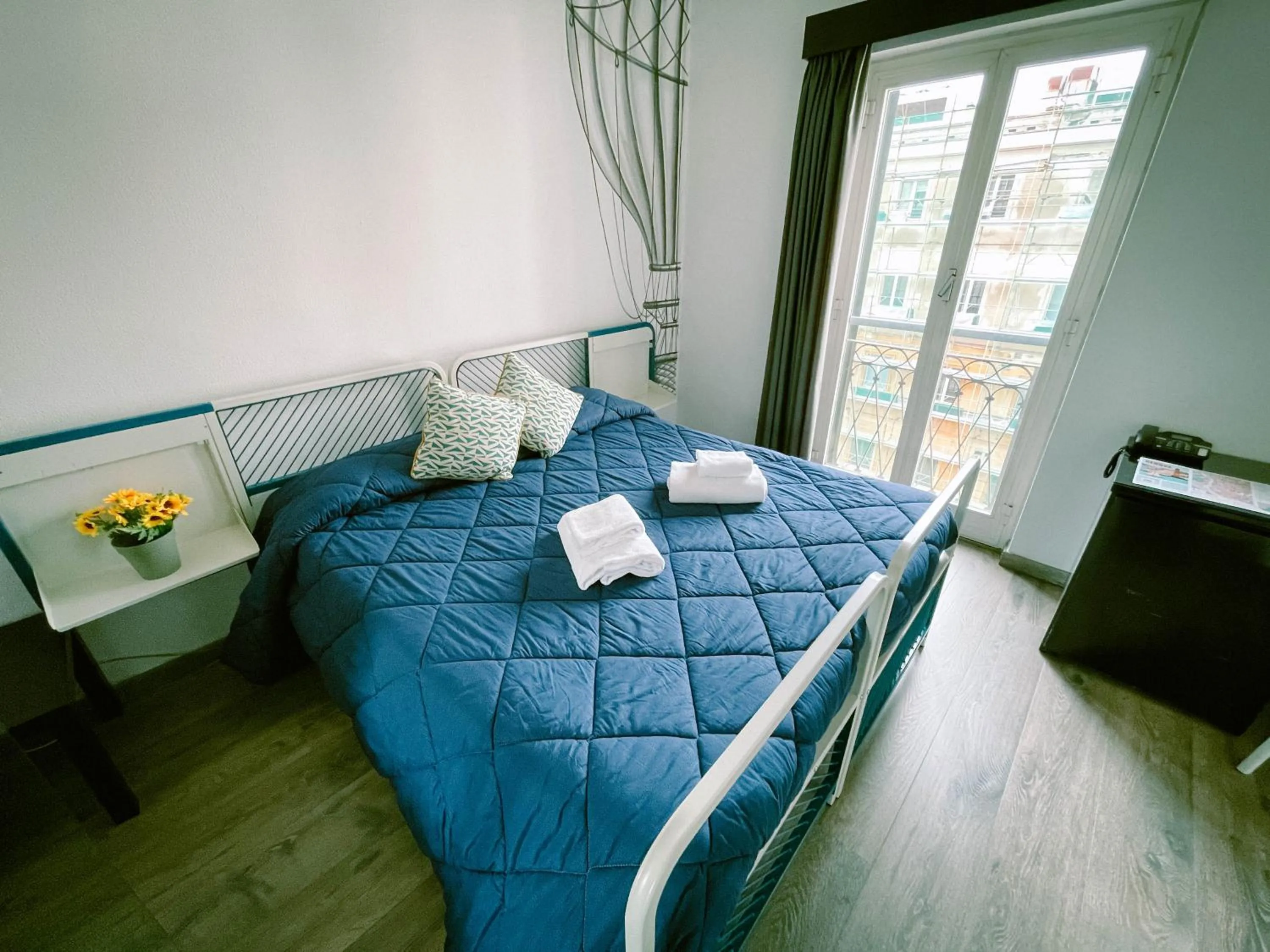 Photo of the whole room, Bed in Ostello Bello Genova