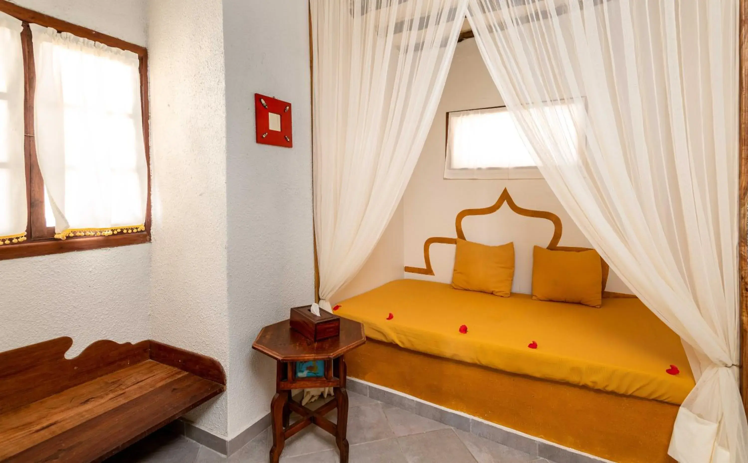 Bed in Karafuu Beach Resort & Spa Bed in Karafuu Beach Resort & Spa
