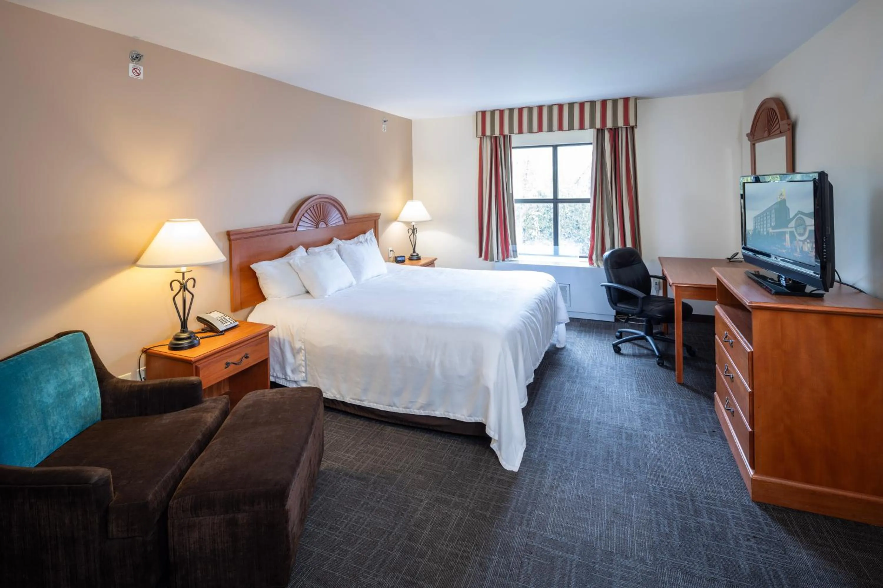 Photo of the whole room, Bed in Akwesasne Mohawk Casino Resort and Players Inn Hotel -formerly Comfort Inn and Suites Hogansburg NY