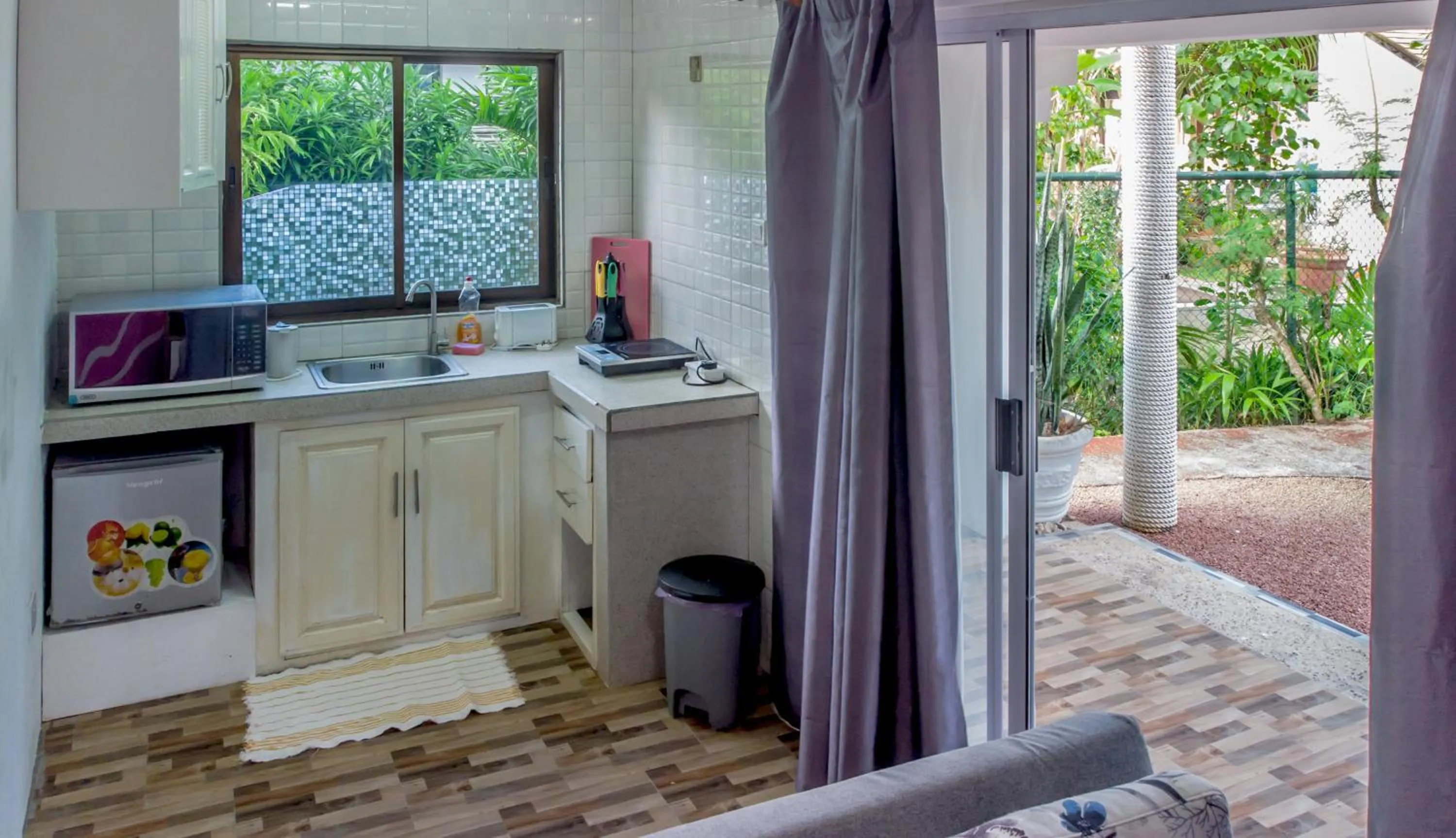 Kitchen or kitchenette in Villa Rafia