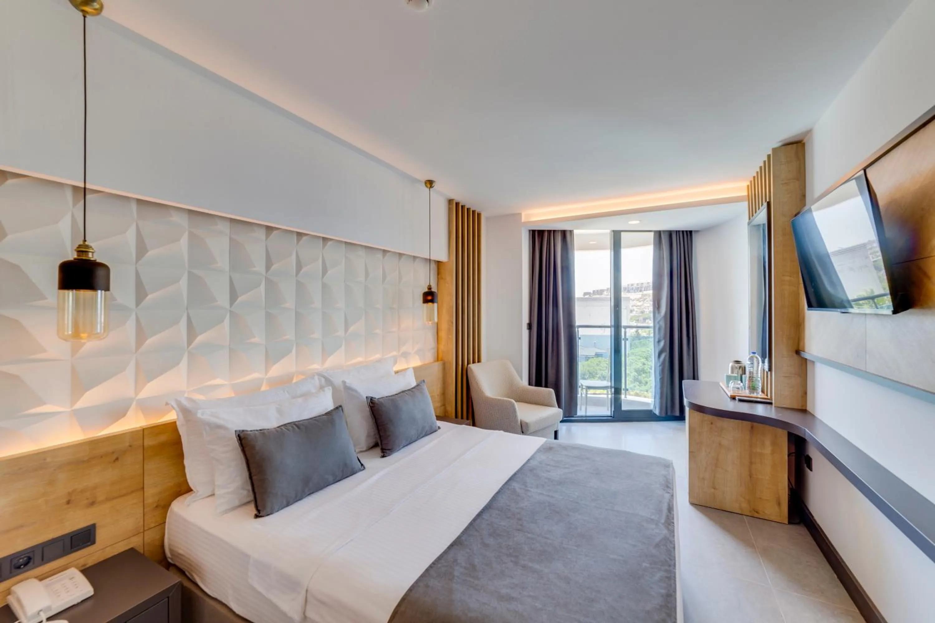 Bed in Signature Blue Resort Kuşadası