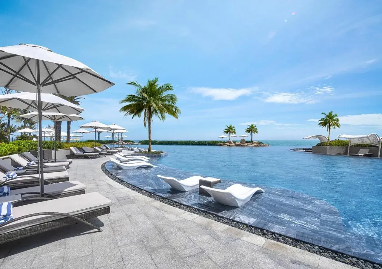 Swimming pool in Holiday Inn Resort Ho Tram Beach by IHG Swimming pool in Holiday Inn Resort Ho Tram Beach by IHG