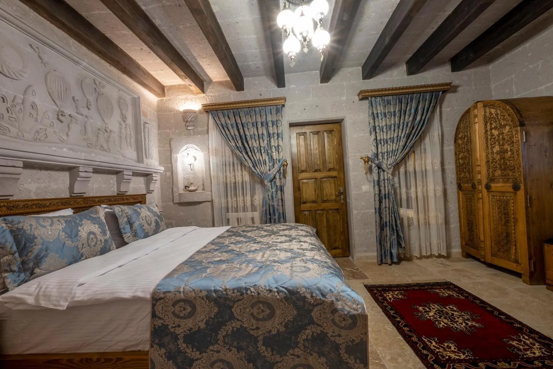 Bed in Underground Cave Suites Hotel