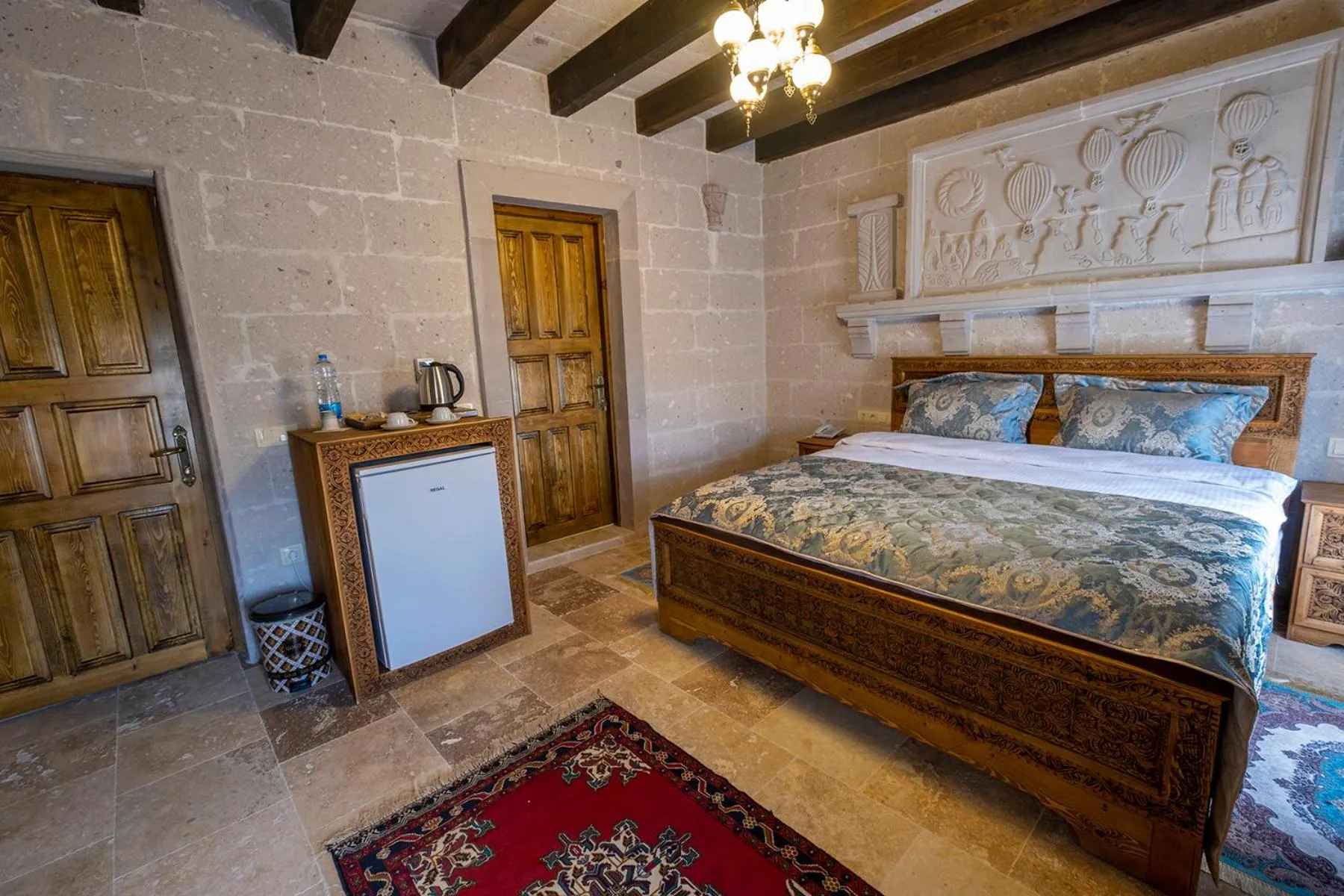 Bed in Underground Cave Suites Hotel