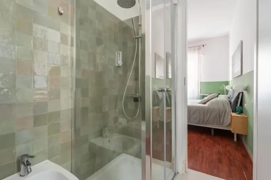 Shower, Bed in Dante Suites