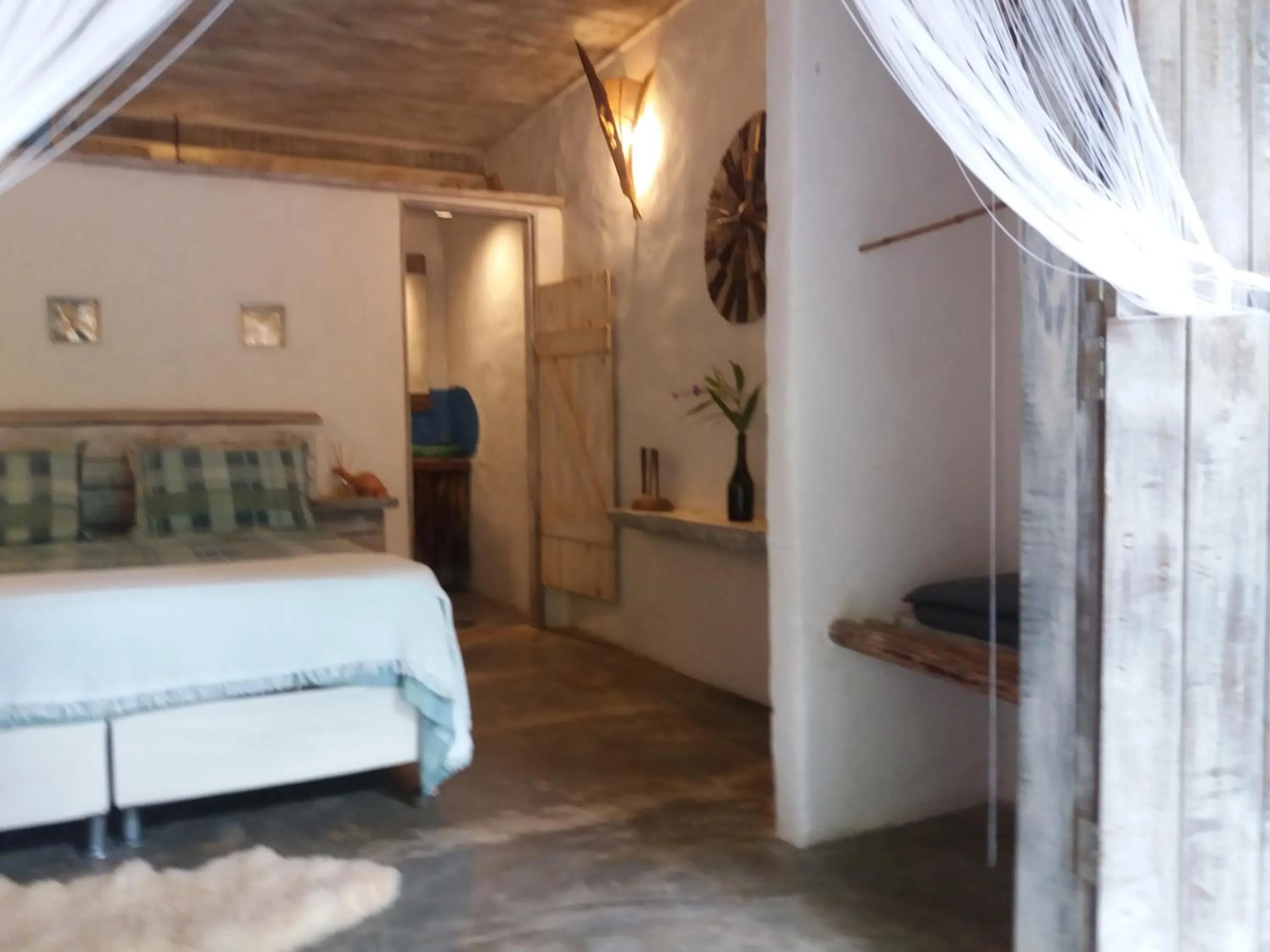 Bed in Casa Namoa Pousada