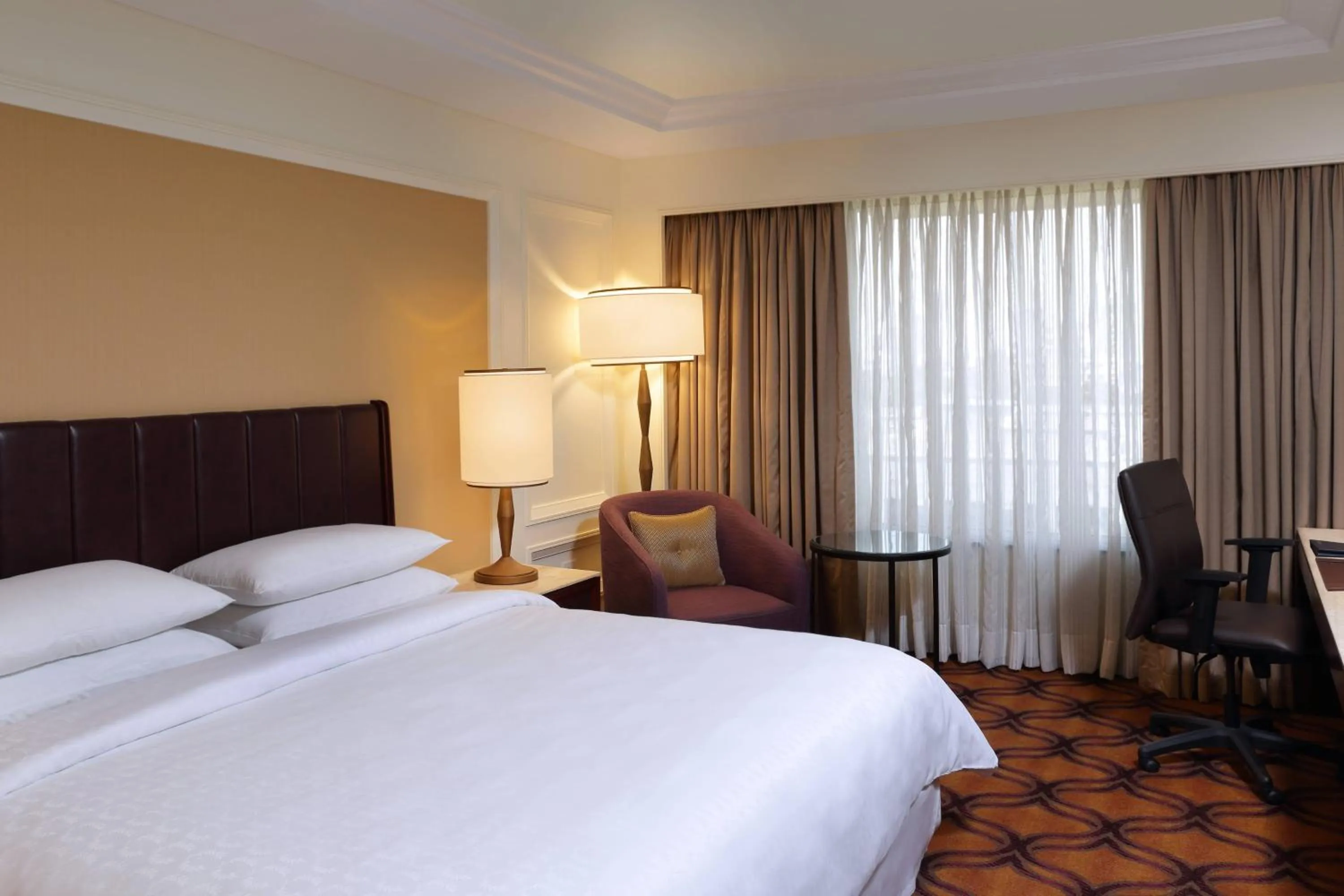 Photo of the whole room, Bed in Sheraton Grand Pune Bund Garden Hotel