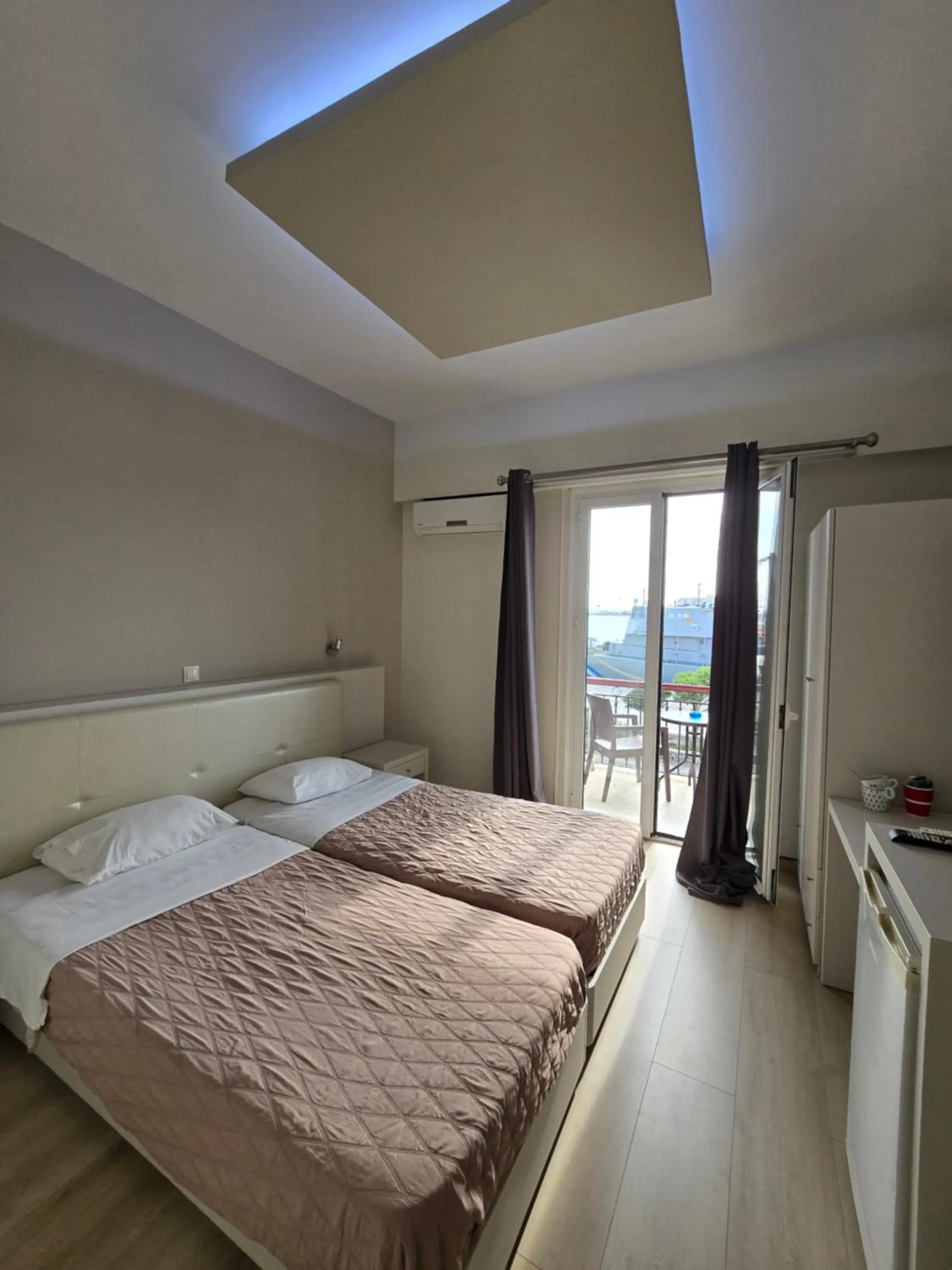 Shower, Bed in Aegean Sea Rooms