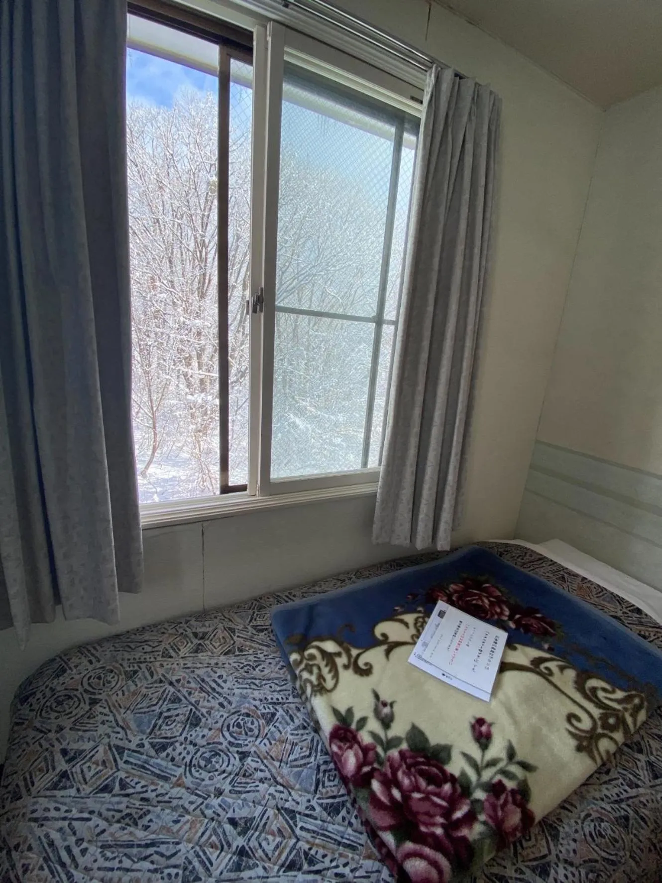 Bed in Hakuba King Hotel