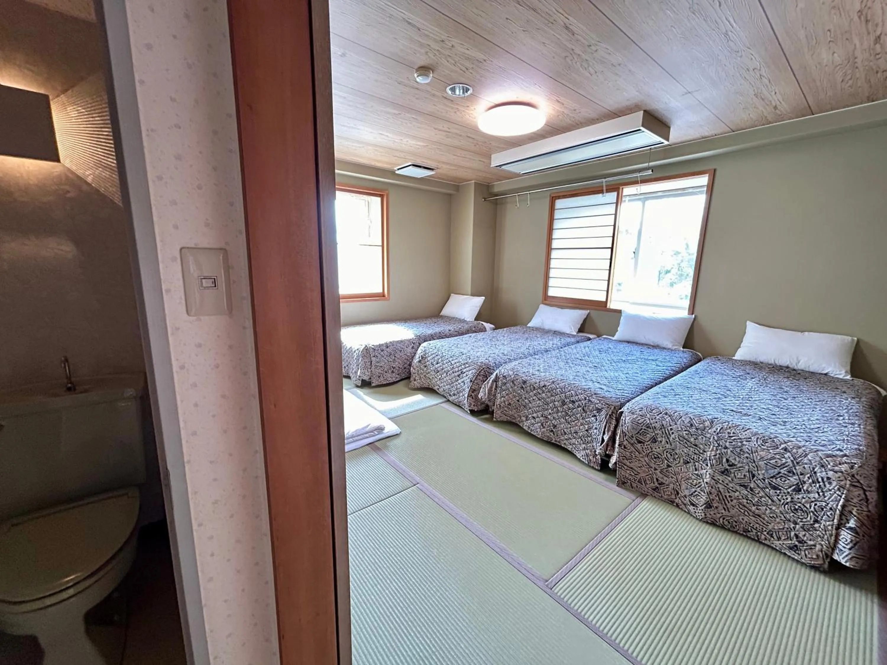 Bed in Hakuba King Hotel