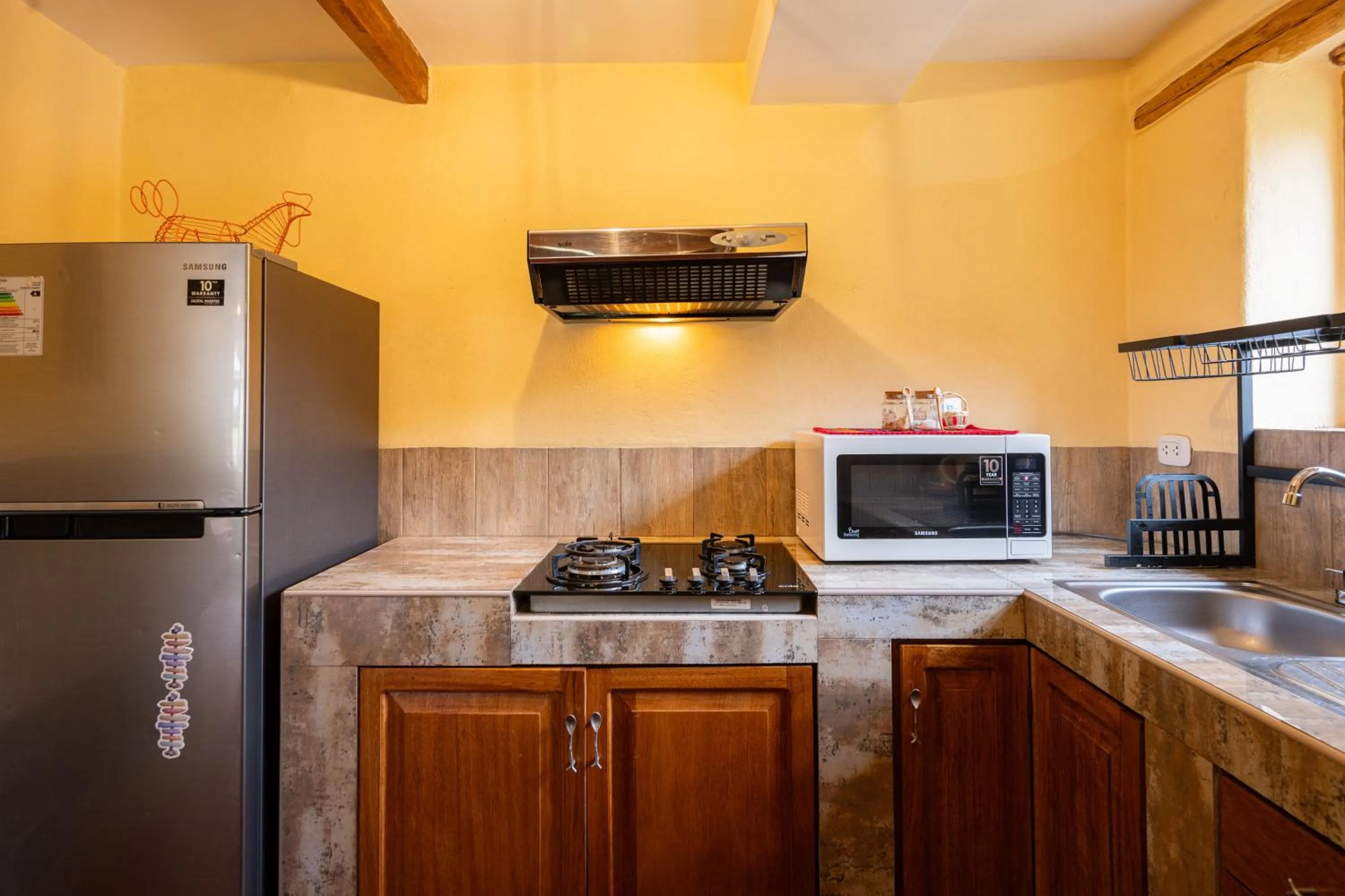 Kitchen or kitchenette in Unuwasi Hotel & Villa