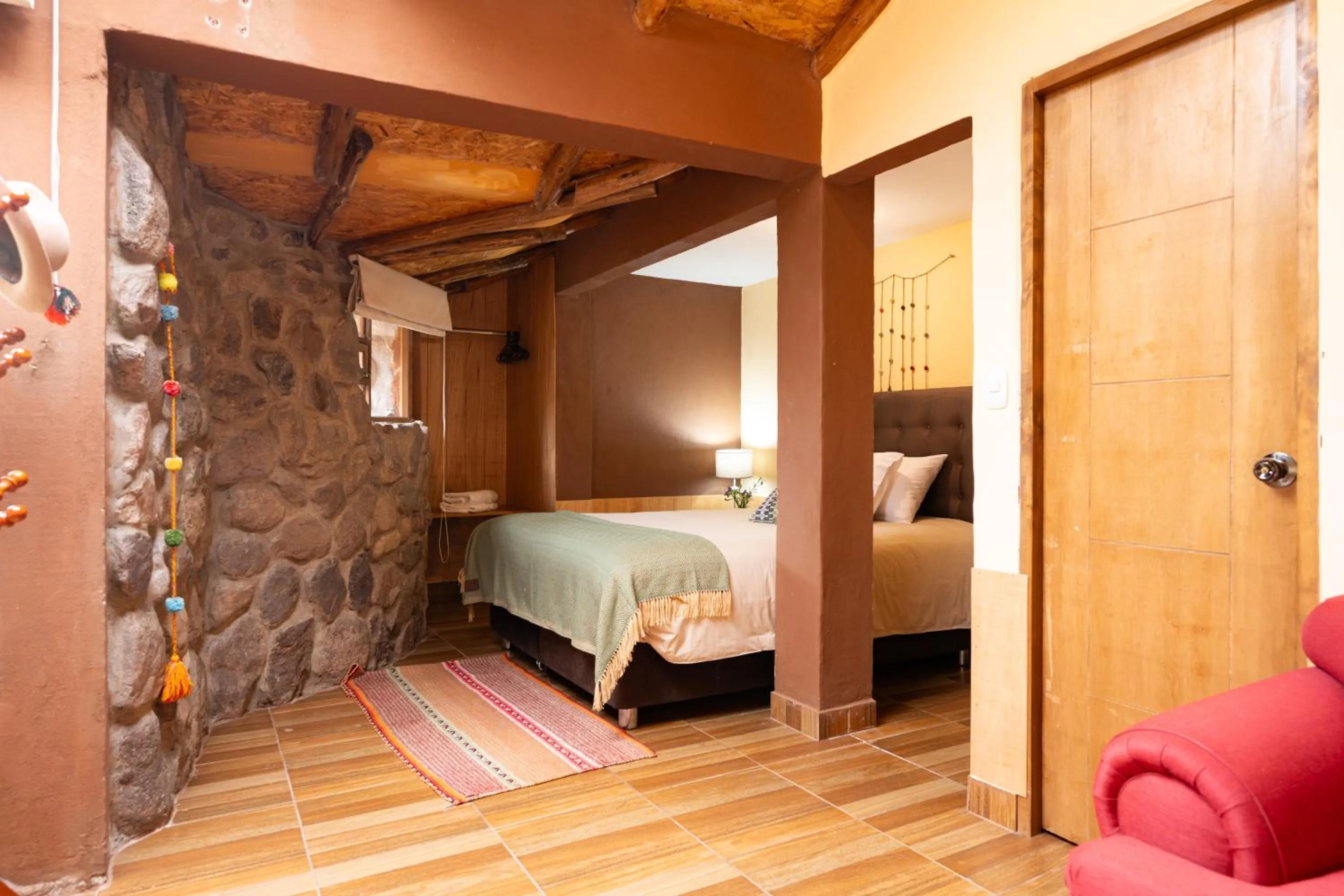 Bed in Unuwasi Hotel & Villa