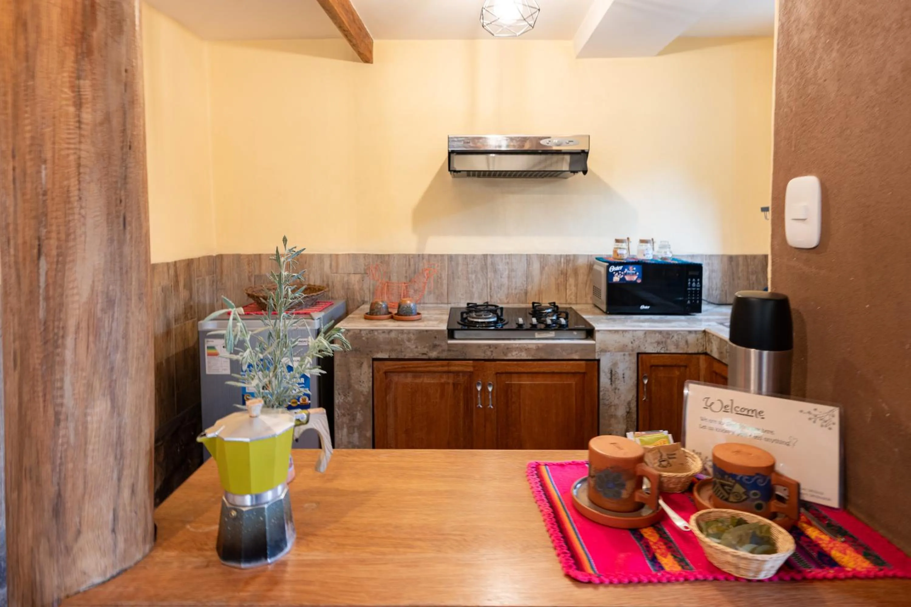 Kitchen or kitchenette in Unuwasi Hotel & Villa