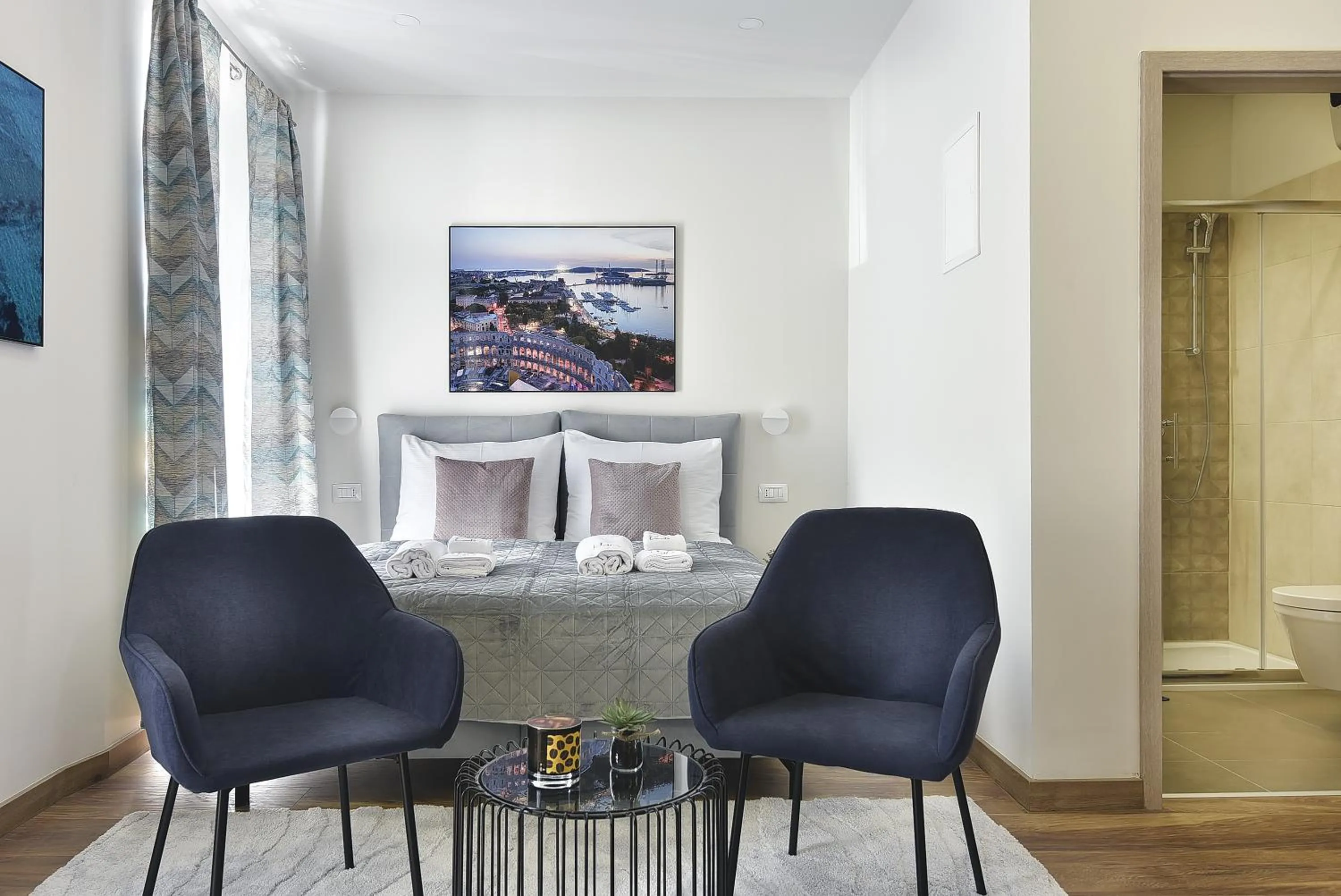 Seating area, Bed in D&A Central Luxury Apartments with FREE Parking