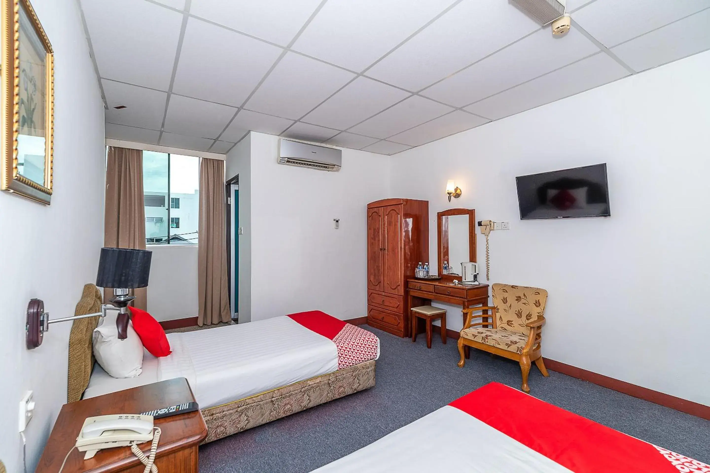 Bedroom in OYO 89864 Hotel Holiday Park
