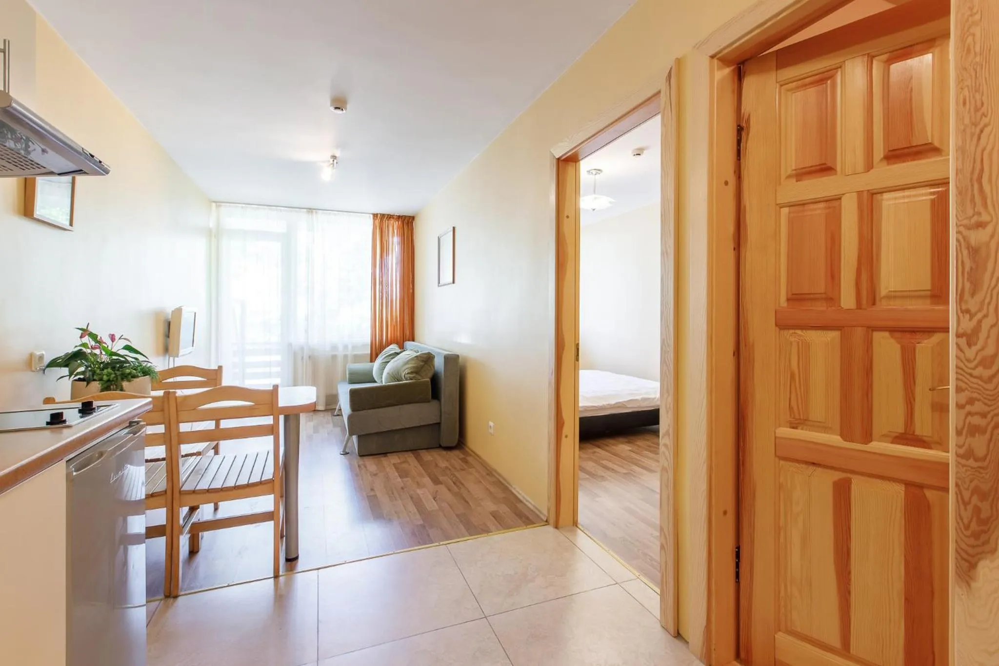 Seating area, Bed in Viešbutis Prie Fontano