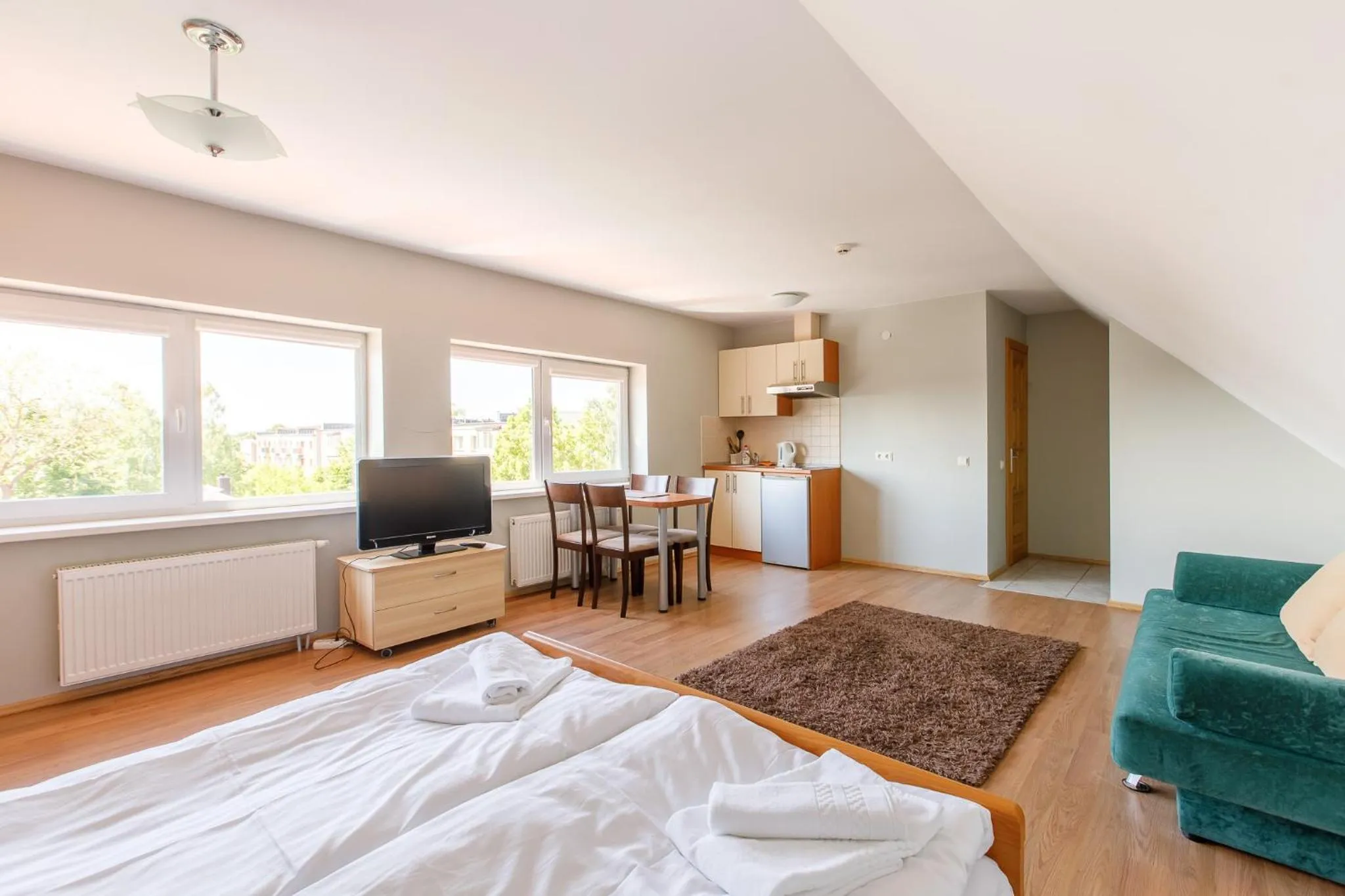 Photo of the whole room in Viešbutis Prie Fontano