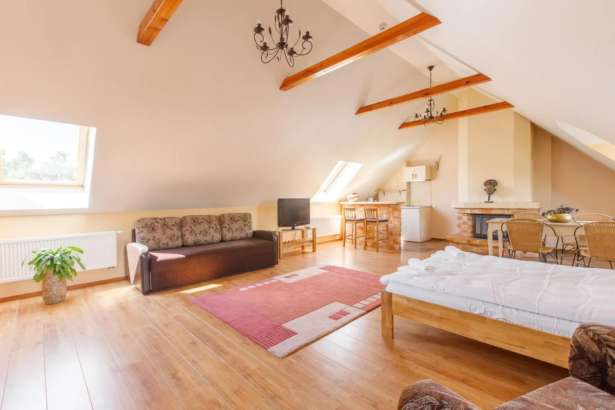 Seating area, Bed in Viešbutis Prie Fontano